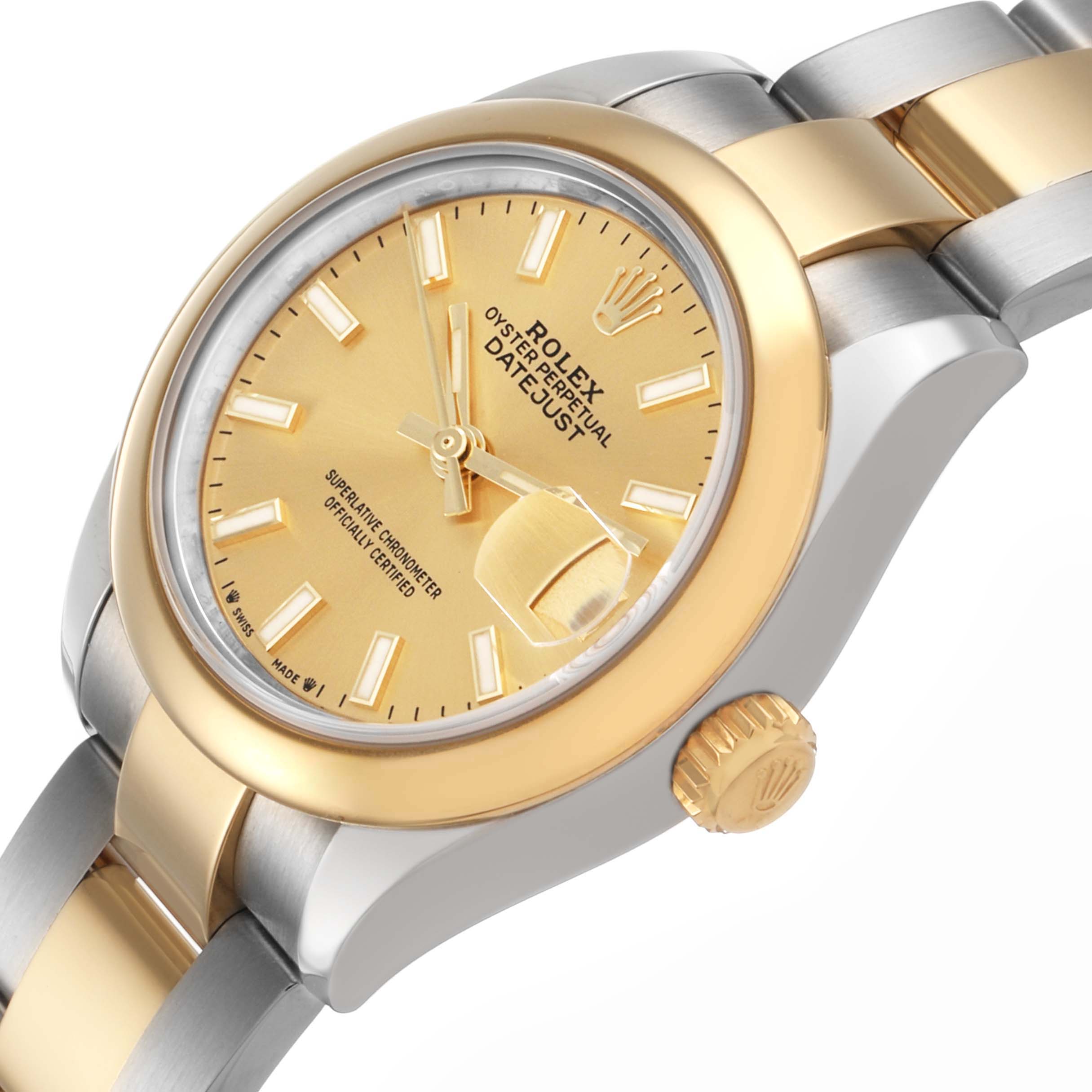 The Rolex Datejust 279173 Women's Stainless Steel Champagne Dial watch is shown at an angled side view, highlighting the gold bezel, crown, and bracelet details.
