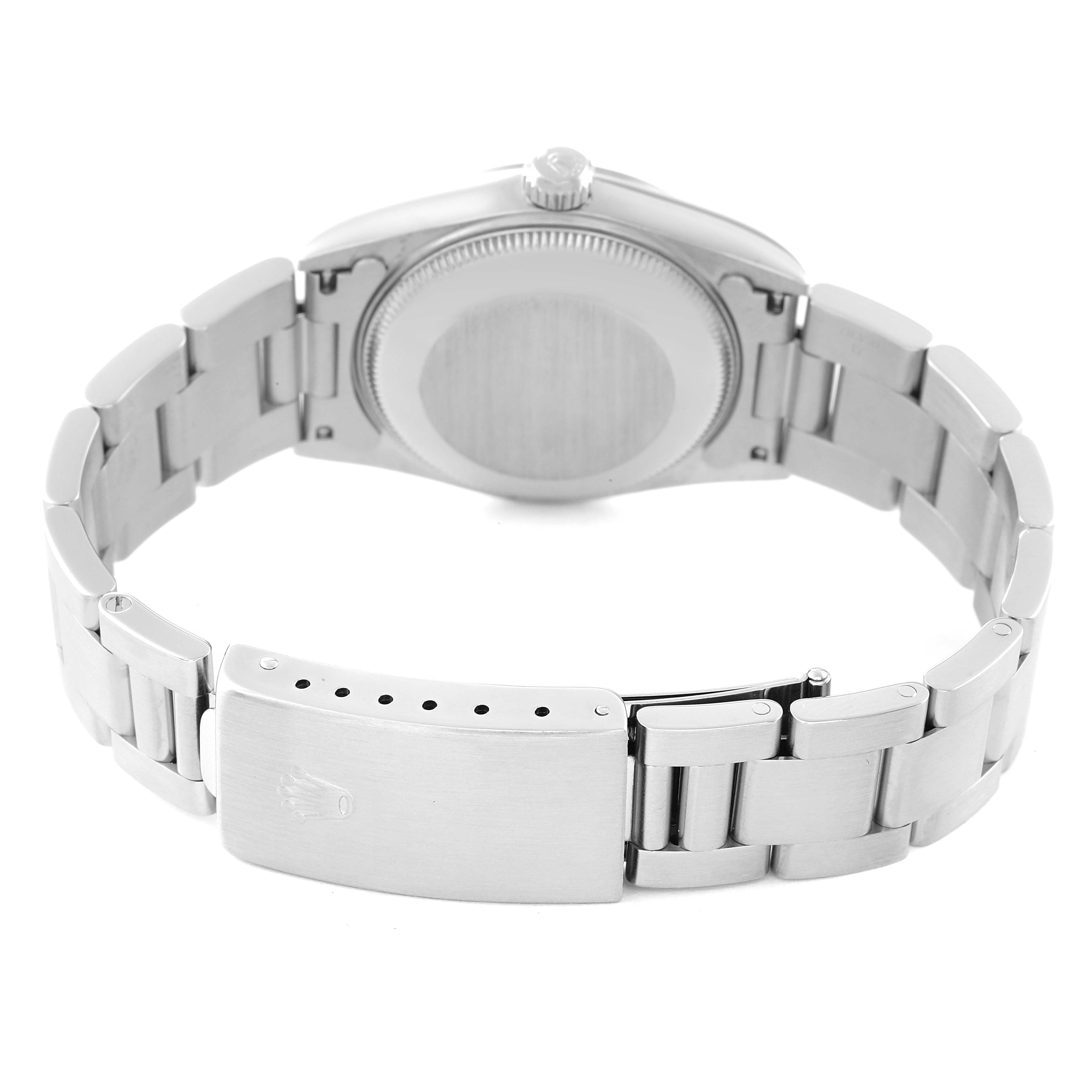 The image shows the back and clasp of a Rolex Mid-Size 78240 Women
s Stainless Steel Pink Dial 78240 Women
s Stainless Steel Pink Dial watch, highlighting the bracelet and case back.