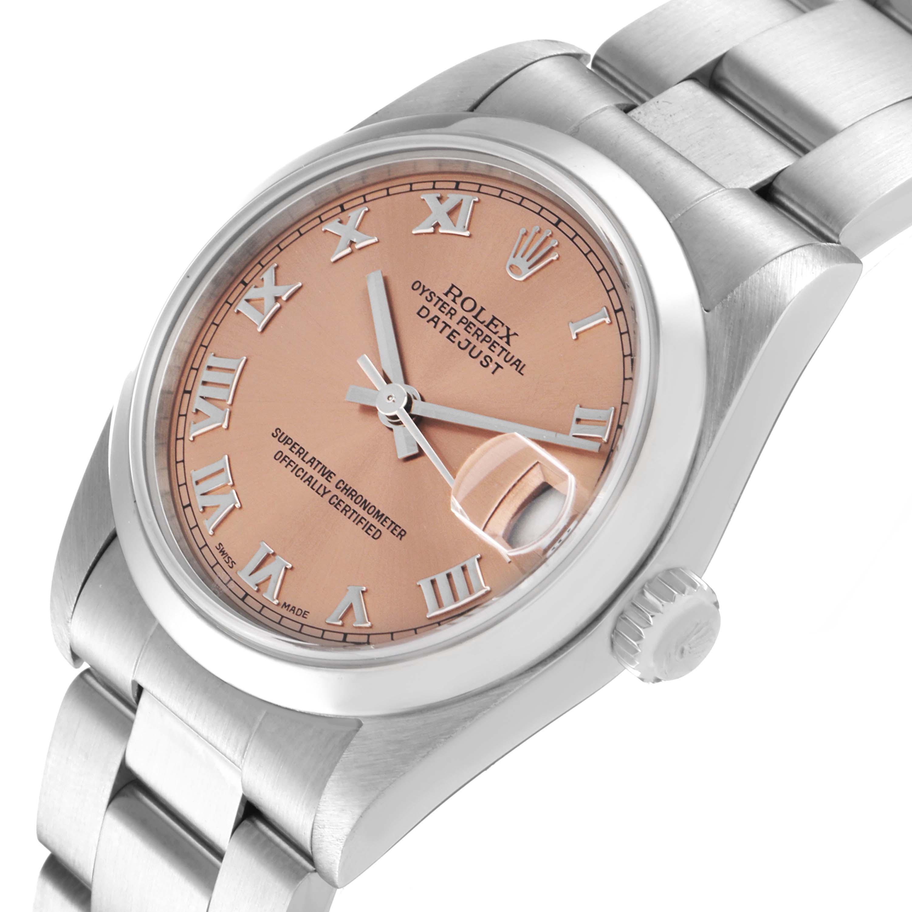 The image shows a Rolex Mid-Size 78240 Women
s Stainless Steel Pink Dial 78240 Women
s Stainless Steel Pink Dial Datejust watch at an angled, side view highlighting the dial, bezel, crown, and part of the bracelet.