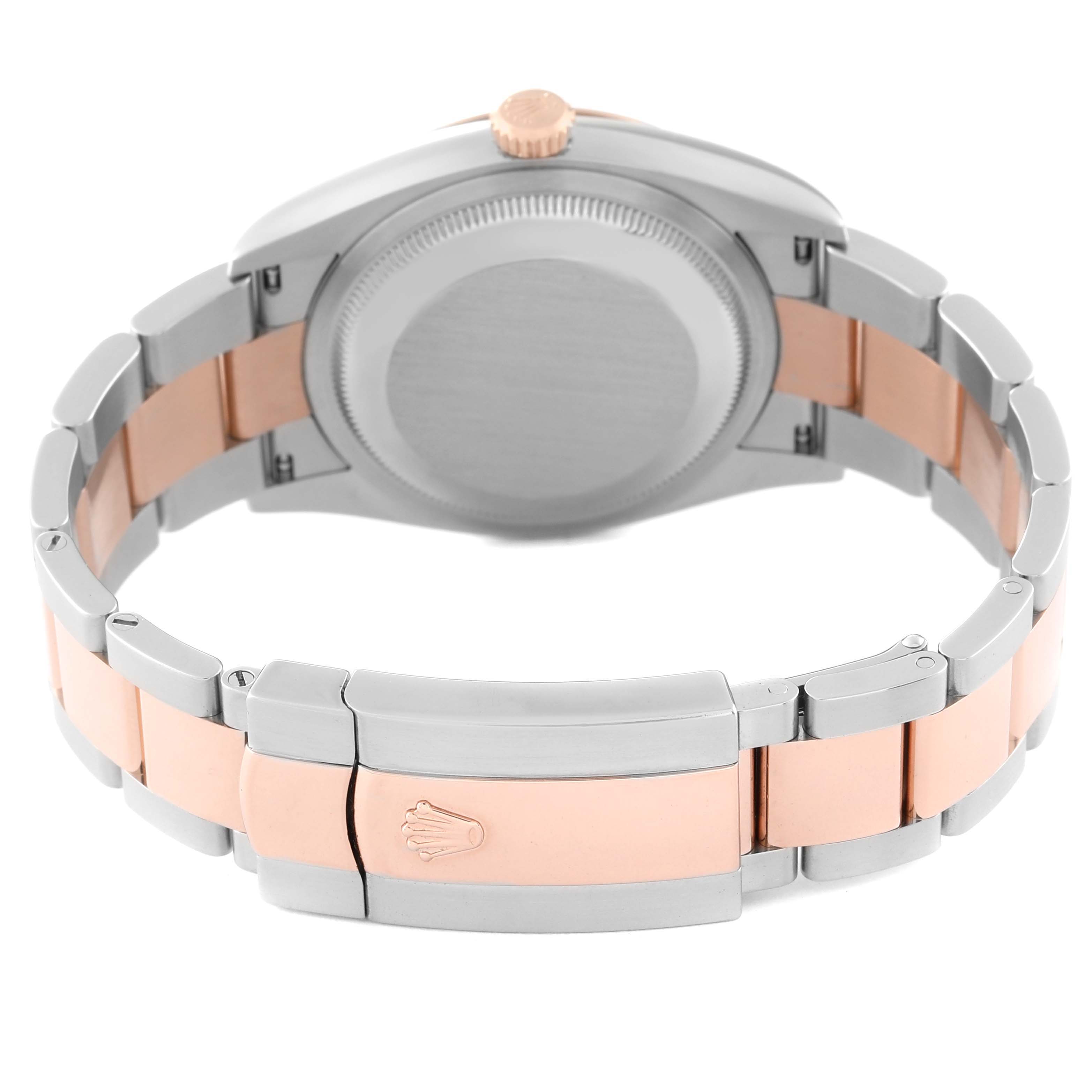 The image shows the back case, crown, and bracelet of a Rolex Datejust 126201 Men's Steel and Gold (two tone) Grey Dial 126201 Men's Steel and Gold (two tone) Grey Dial watch, highlighting its two-tone metal links and clasp.