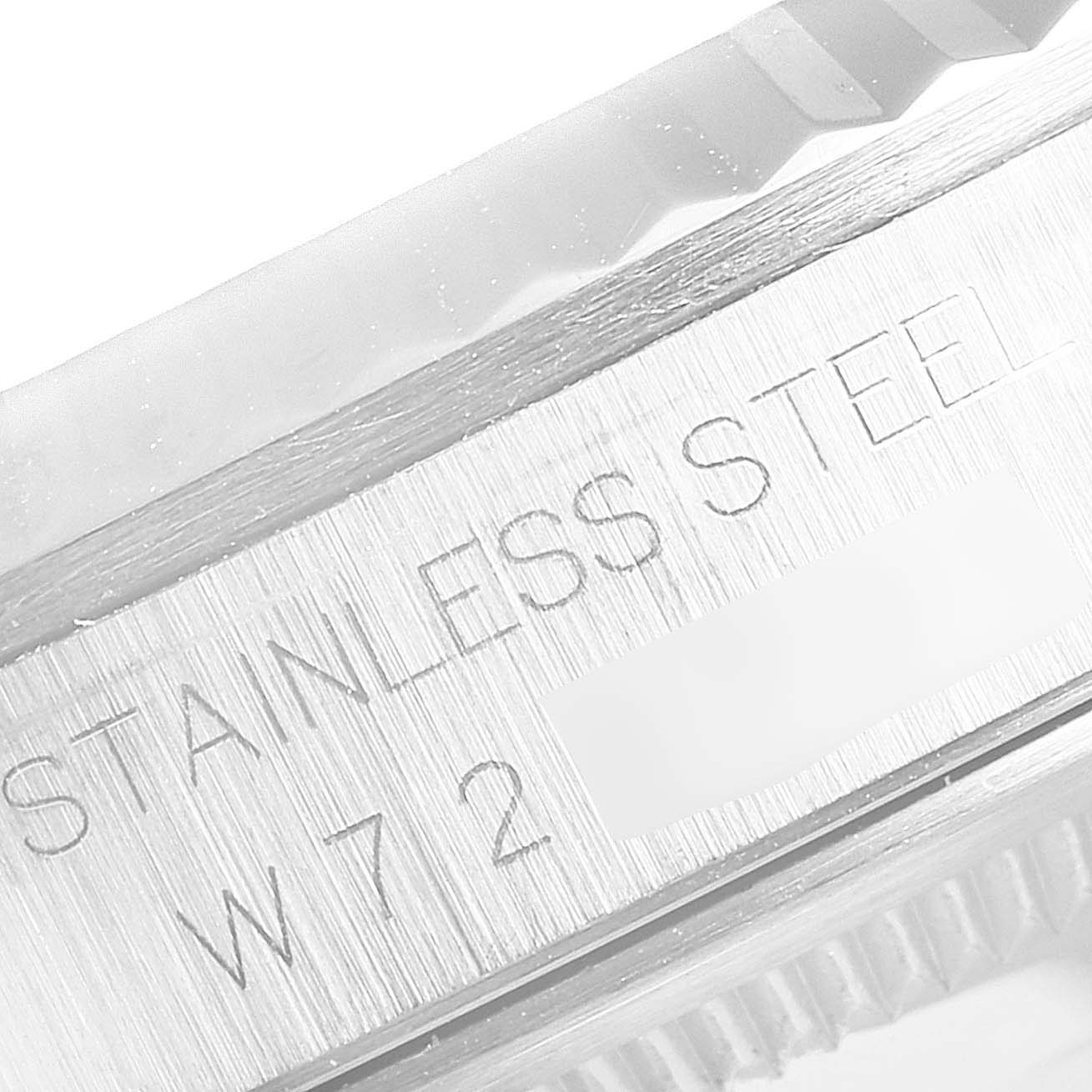 The image shows a close-up of the side engraving on a stainless steel Rolex Datejust 16234 Men's Stainless Steel White Dial 16234 Men's Stainless Steel White Dial watch case.