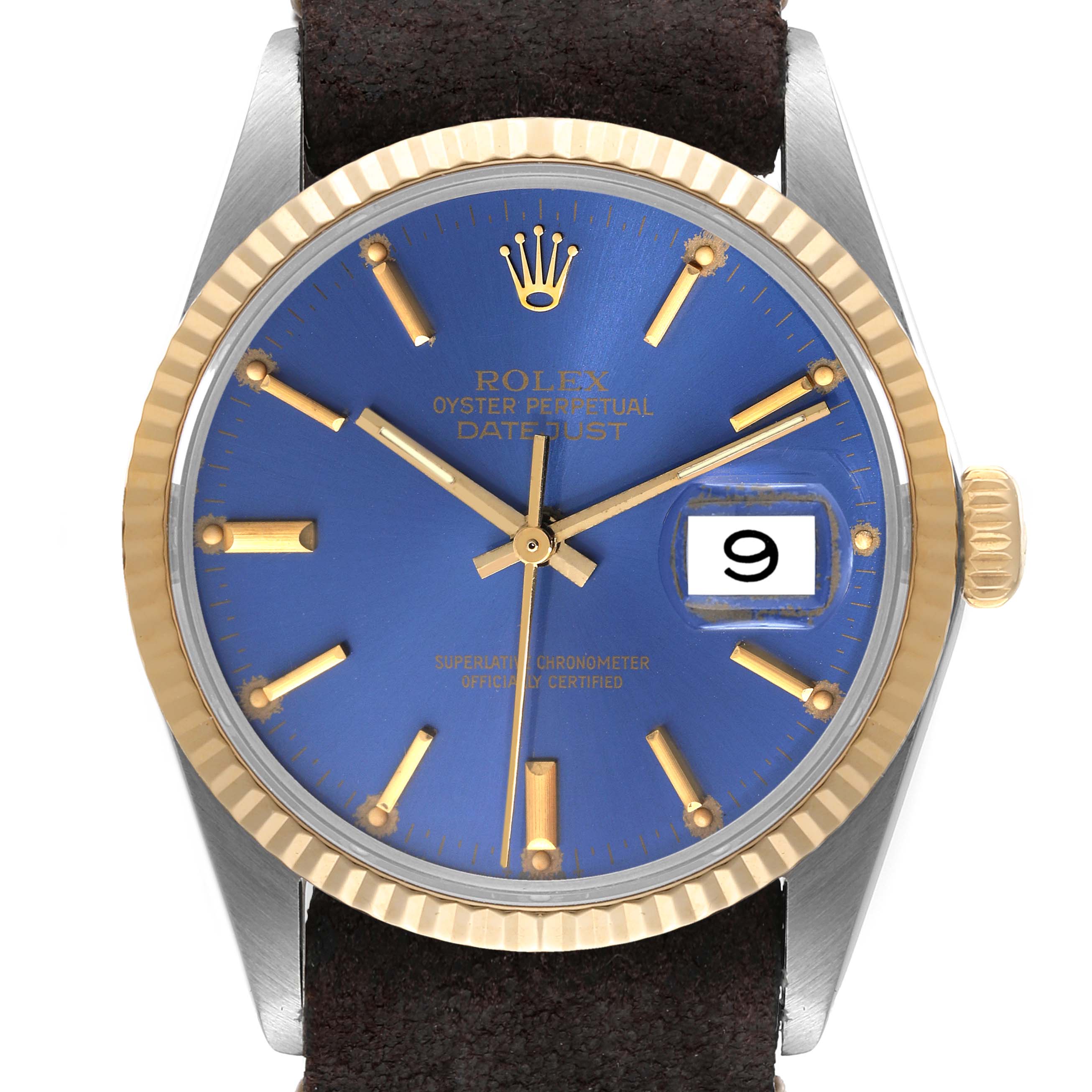 The image shows a front view of a Vintage Collection Rolex Oyster Perpetual Datejust watch, highlighting its blue dial and gold elements.