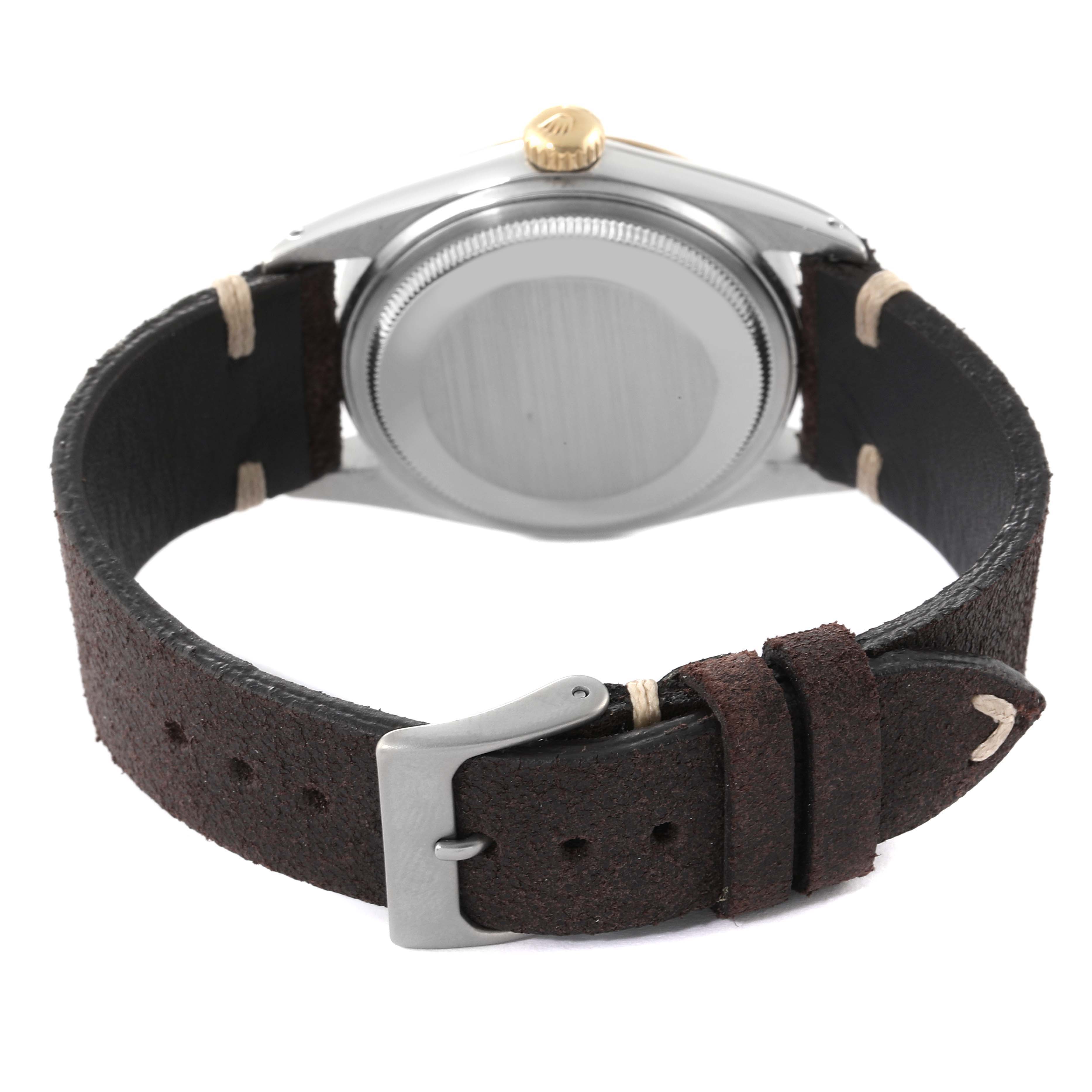 The image shows the back case and leather strap of a Rolex Vintage Collection 16013 Men's Steel and Gold (two tone) Blue Dial 16013 Men's Steel and Gold (two tone) Blue Dial model watch.