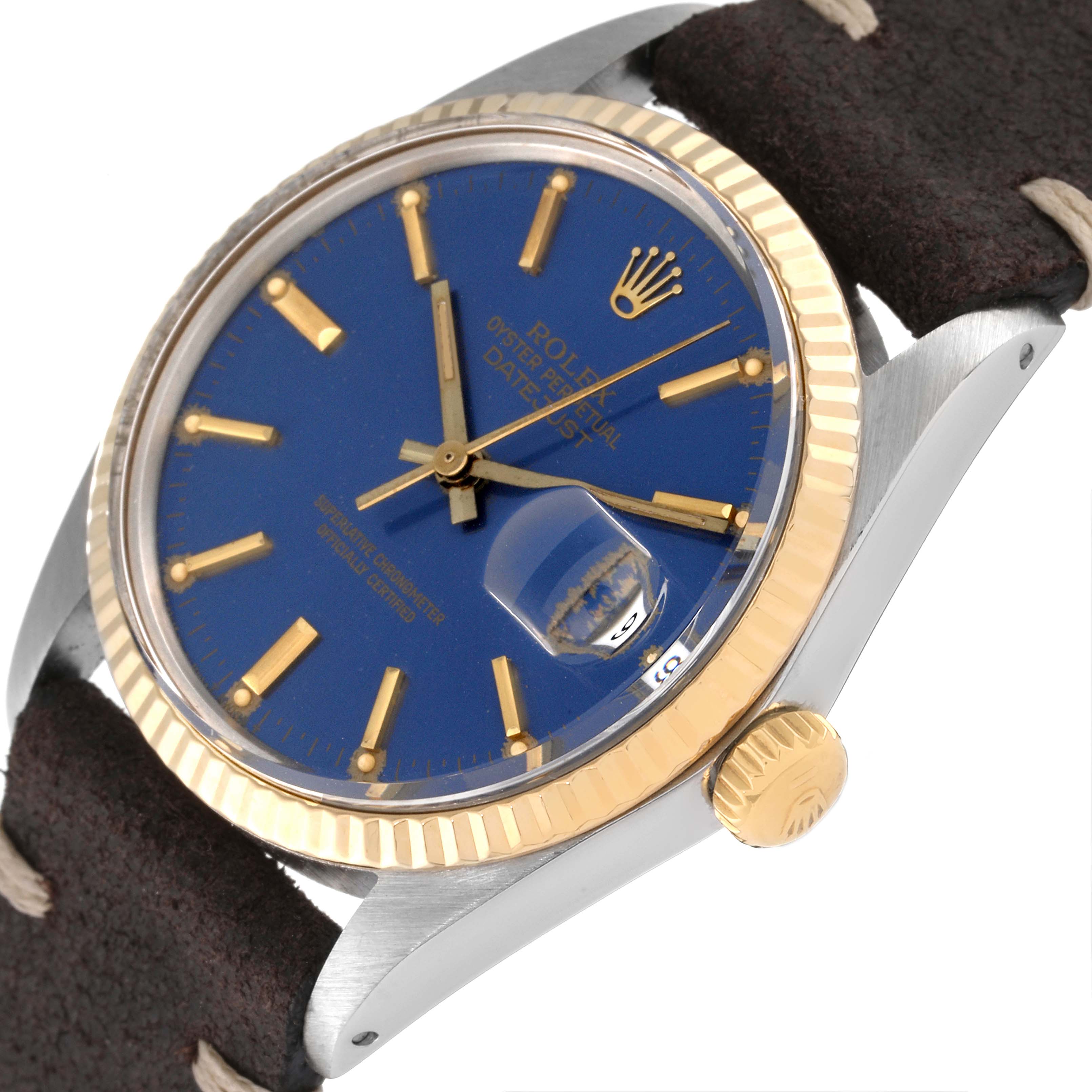 The image shows a side angle of a Rolex Vintage Collection 16013 Men's Steel and Gold (two tone) Blue Dial 16013 Men's Steel and Gold (two tone) Blue Dial watch featuring its blue dial, gold markers, fluted bezel, and crown.