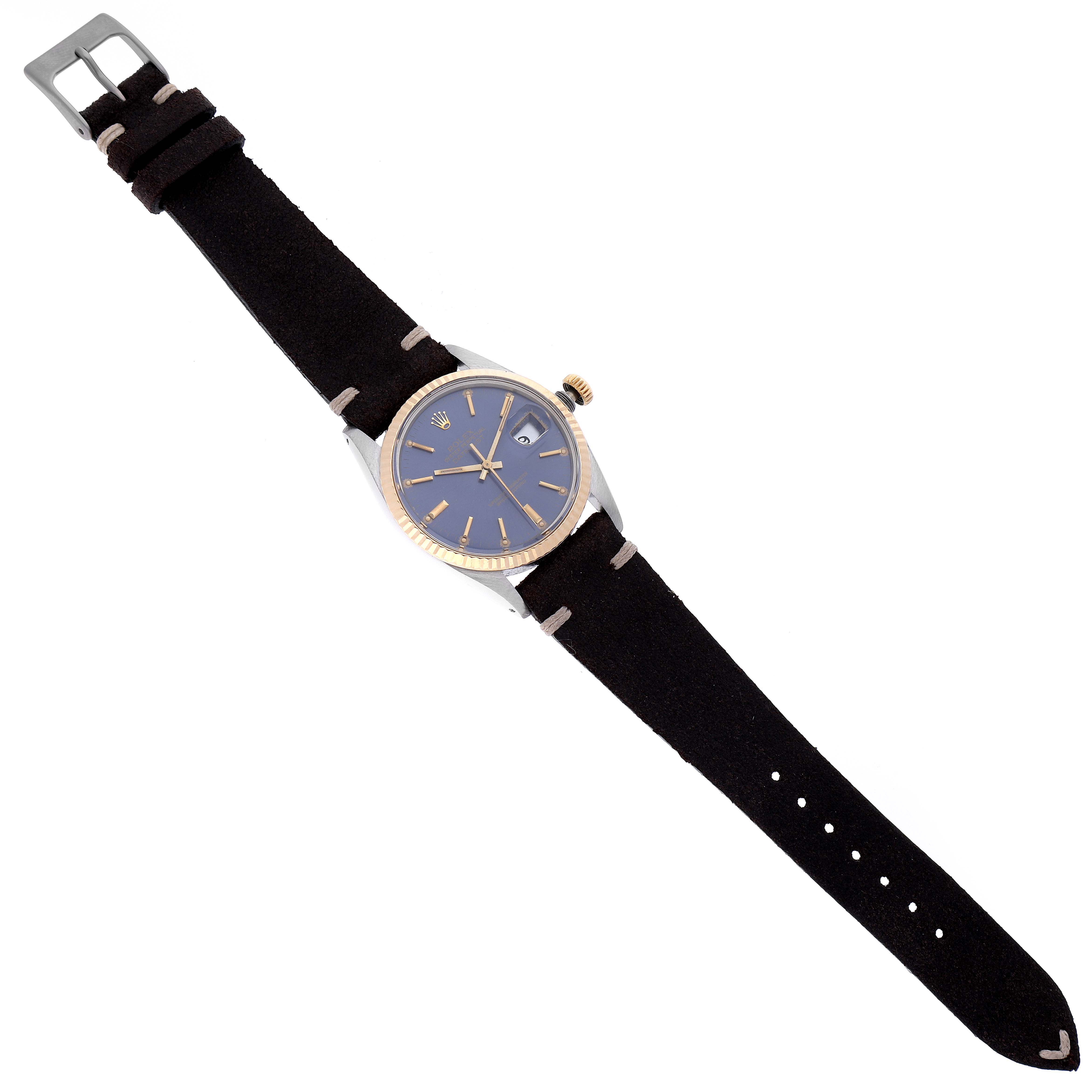 The Rolex Vintage Collection 16013 Men's Steel and Gold (two tone) Blue Dial 16013 Men's Steel and Gold (two tone) Blue Dial watch is shown at a straight top-down angle, displaying the blue dial, gold bezel, and black strap.