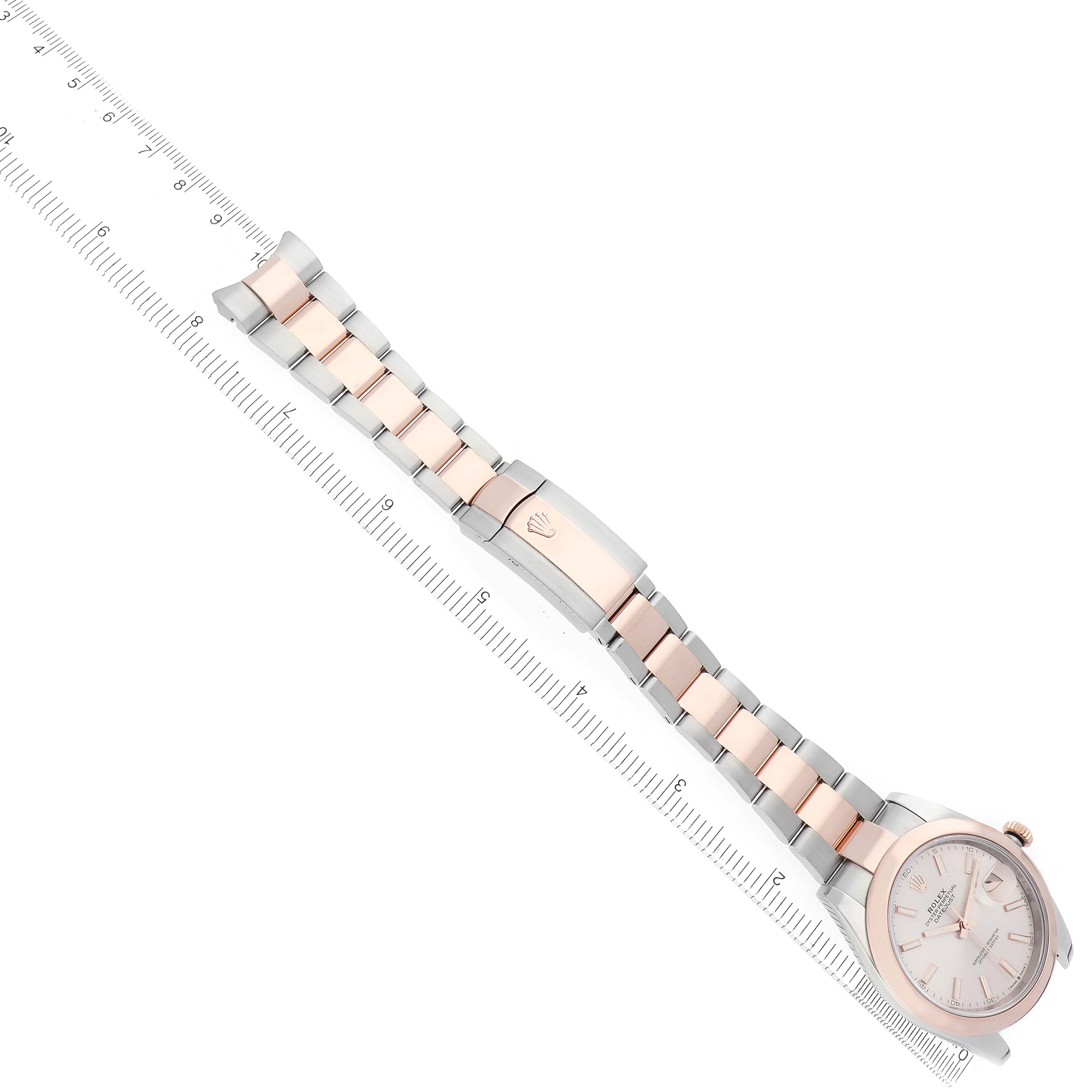 The Rolex Datejust 41 126301 Men
s Steel and Gold (two tone) Pink Dial watch is shown at a top-down angle, displaying the full bracelet, clasp, and face.