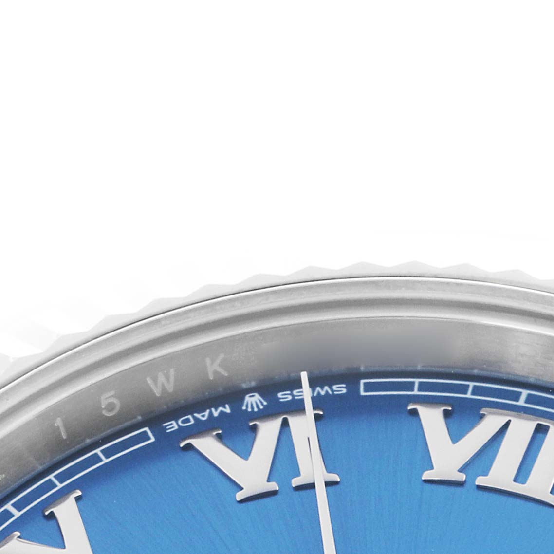 The image shows a close-up of the Rolex Datejust 41 126334 Men
s Stainless Steel Blue Dial
s blue dial with Roman numerals and part of the bezel.