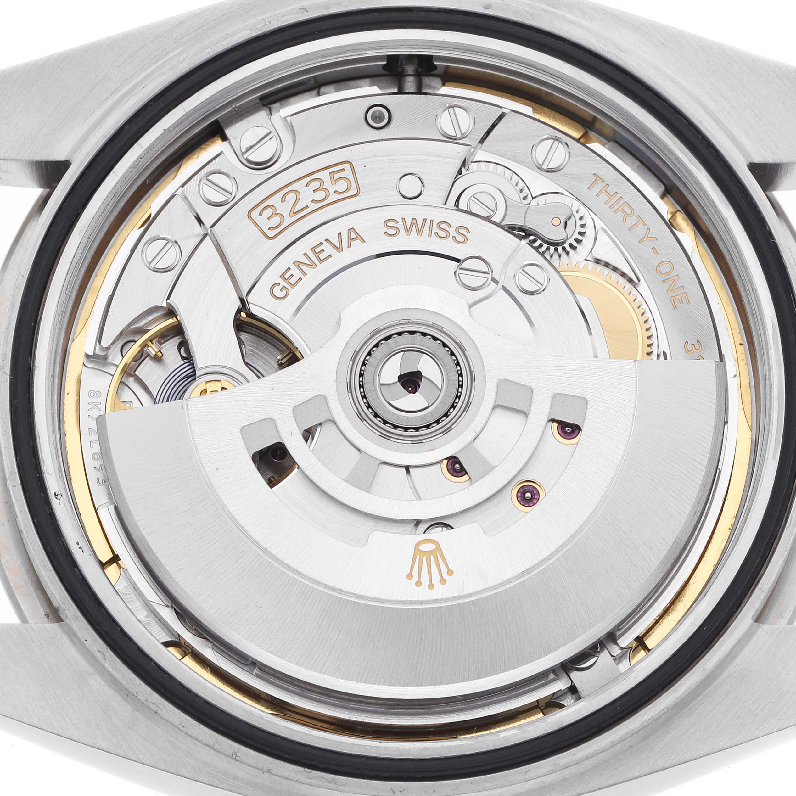 The image shows the back view of a Rolex Datejust 41 126334 Men
s Stainless Steel Blue Dial, highlighting its intricate movement and rotor mechanism.