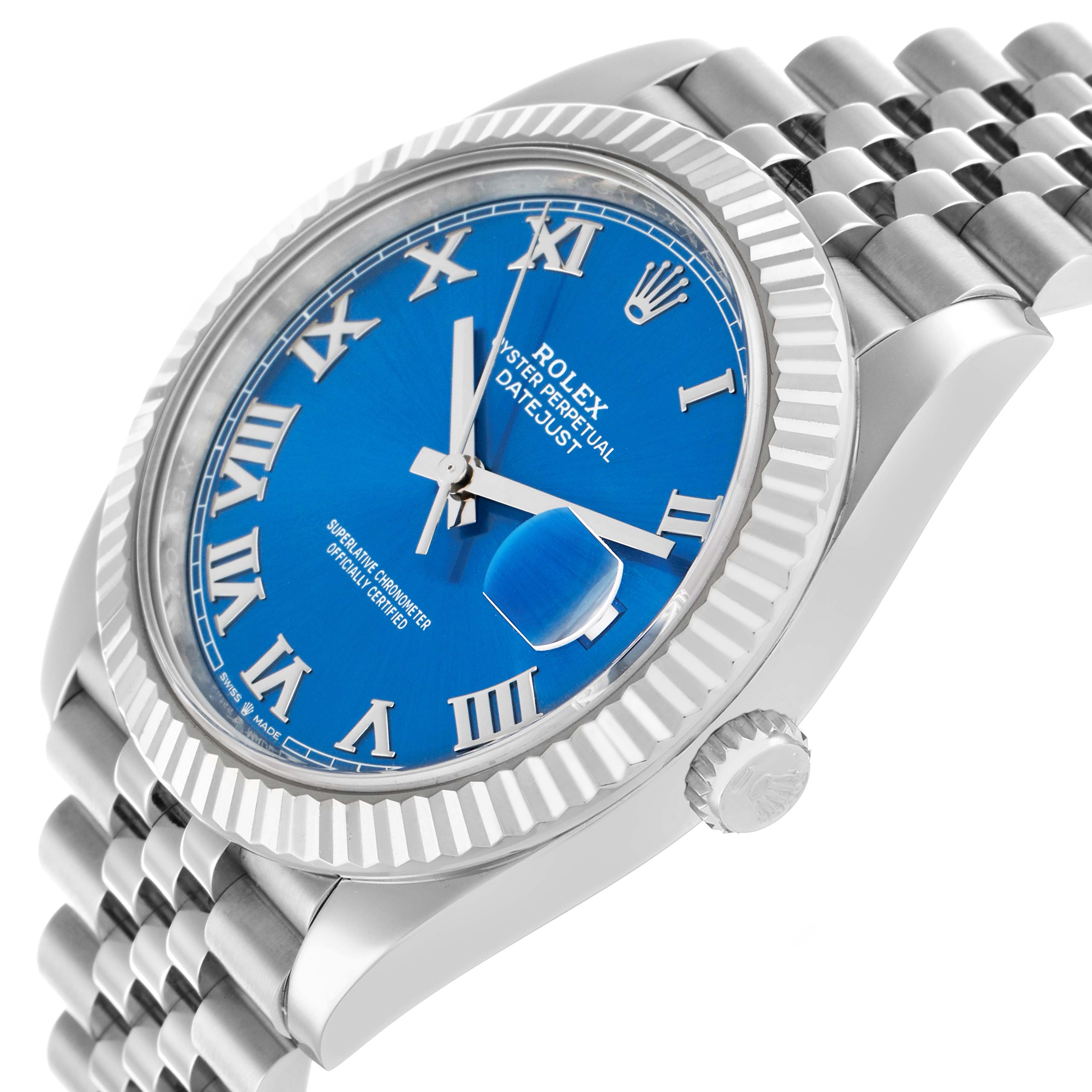 The Rolex Datejust 41 126334 Men
s Stainless Steel Blue Dial is shown at a three-quarter angle, highlighting the blue dial, fluted bezel, and part of the jubilee bracelet.