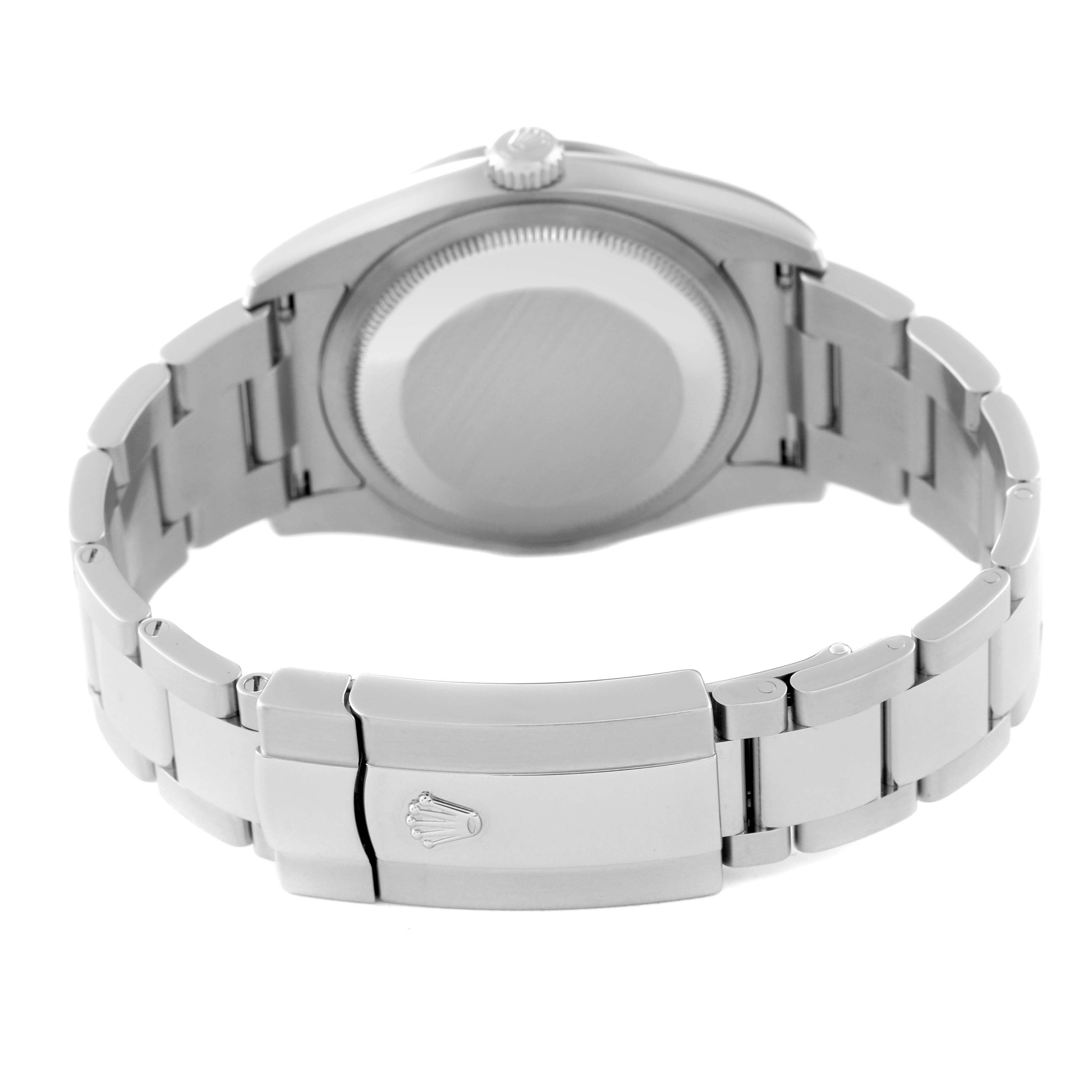 The image shows the back view of the Rolex Datejust 116244 Men's Stainless Steel Black Dial 116244 Men's Stainless Steel Black Dial watch, displaying its bracelet and clasp with the Rolex crown logo.