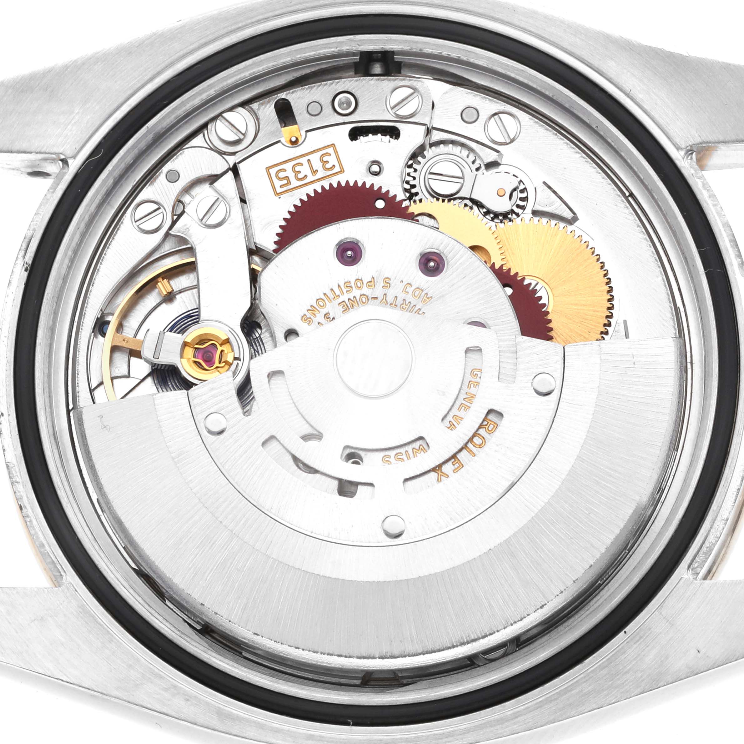 The image shows the movement of a Rolex Datejust 116243 Men's Steel and Gold (two tone) Champagne Dial watch from a rear angle, highlighting the rotor and gears.