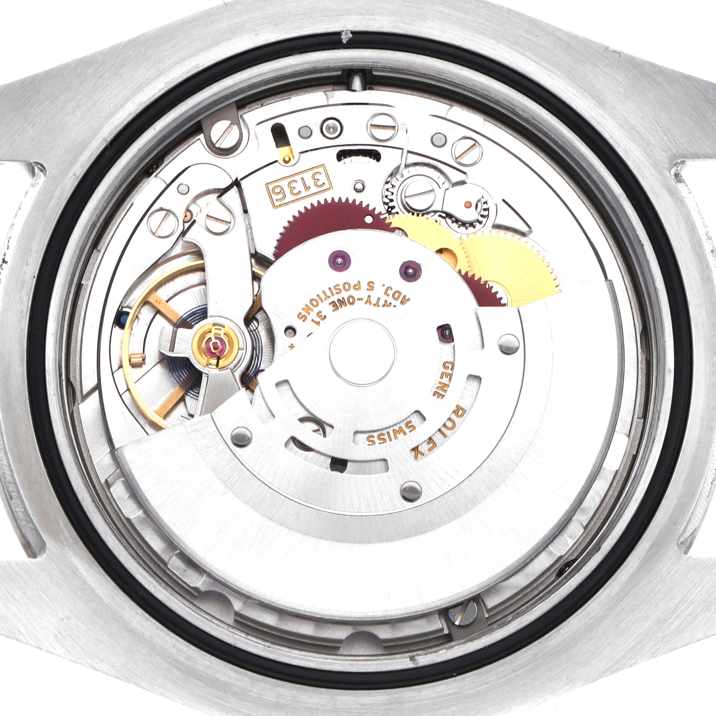 The image shows the movement mechanism of a Rolex Datejust 41 116334 Men
s Stainless Steel Silver Dial watch from the back, highlighting gears and components.