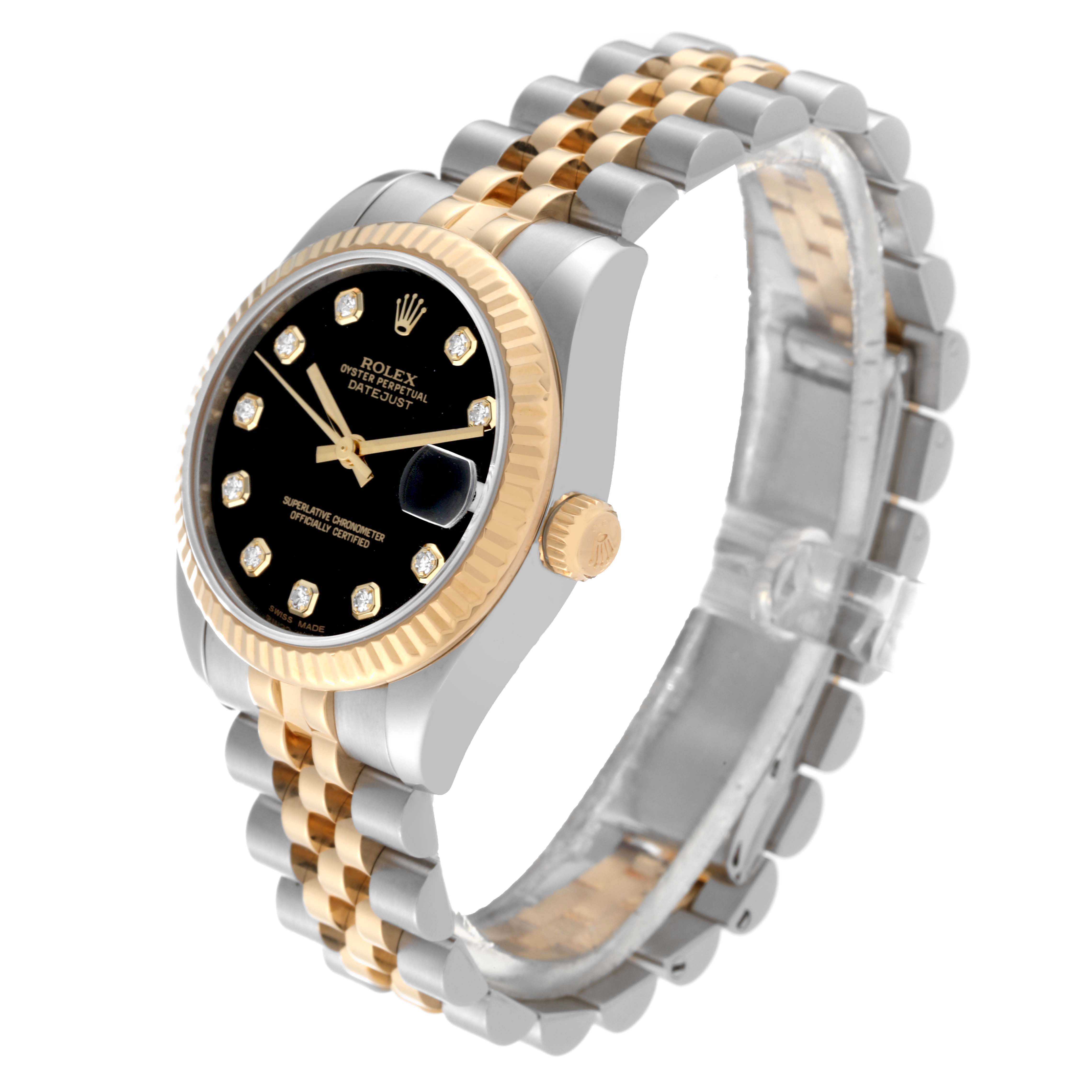This Rolex Mid-Size 178273 Women's Steel and Gold (two tone) Black Dial 178273 Women's Steel and Gold (two tone) Black Dial watch is viewed from an angled perspective, showing the face, bracelet, bezel, and crown.