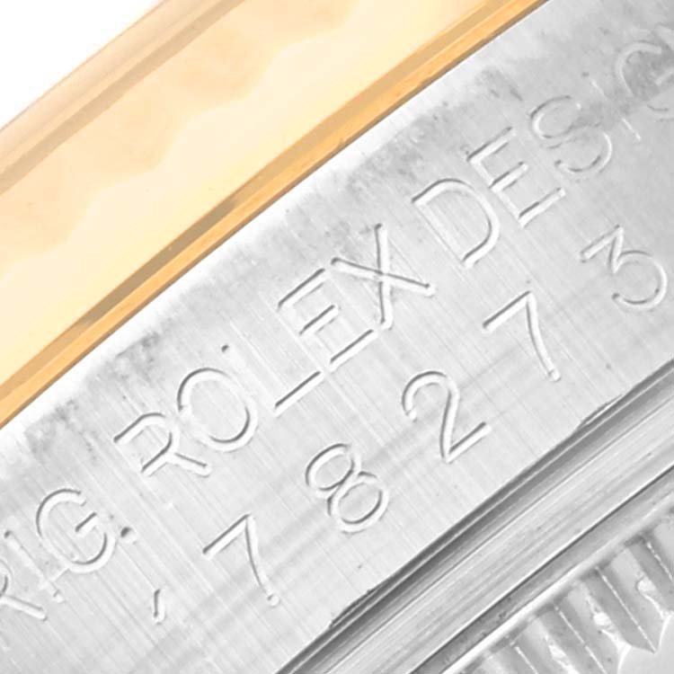 The image shows a close-up of the side engraving on a Rolex Mid-Size 178273 Women's Steel and Gold (two tone) Black Dial 178273 Women's Steel and Gold (two tone) Black Dial model watch.