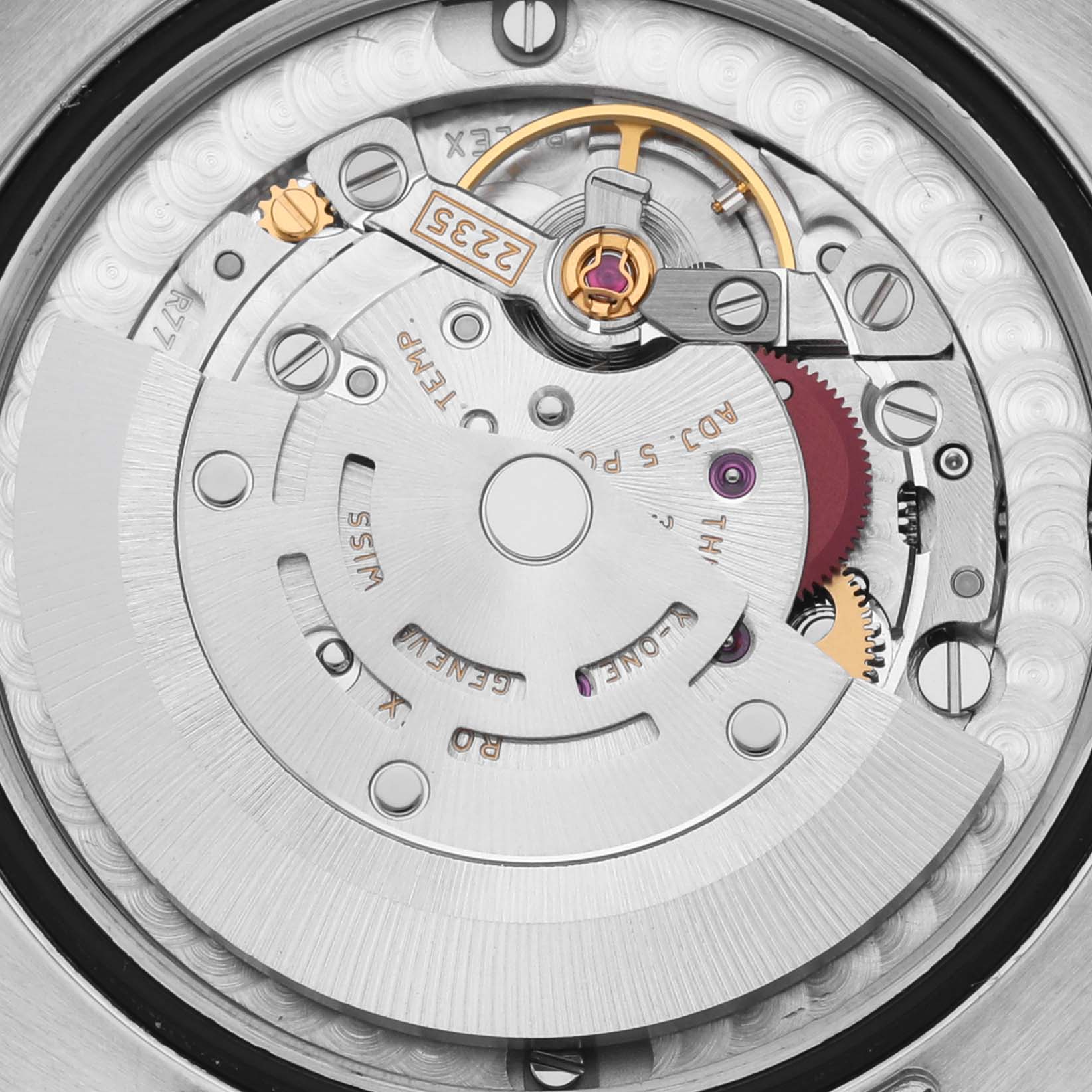 The image shows the movement and intricate inner mechanism of a Rolex Mid-Size 178273 Women's Steel and Gold (two tone) Black Dial 178273 Women's Steel and Gold (two tone) Black Dial watch, viewed from the back.