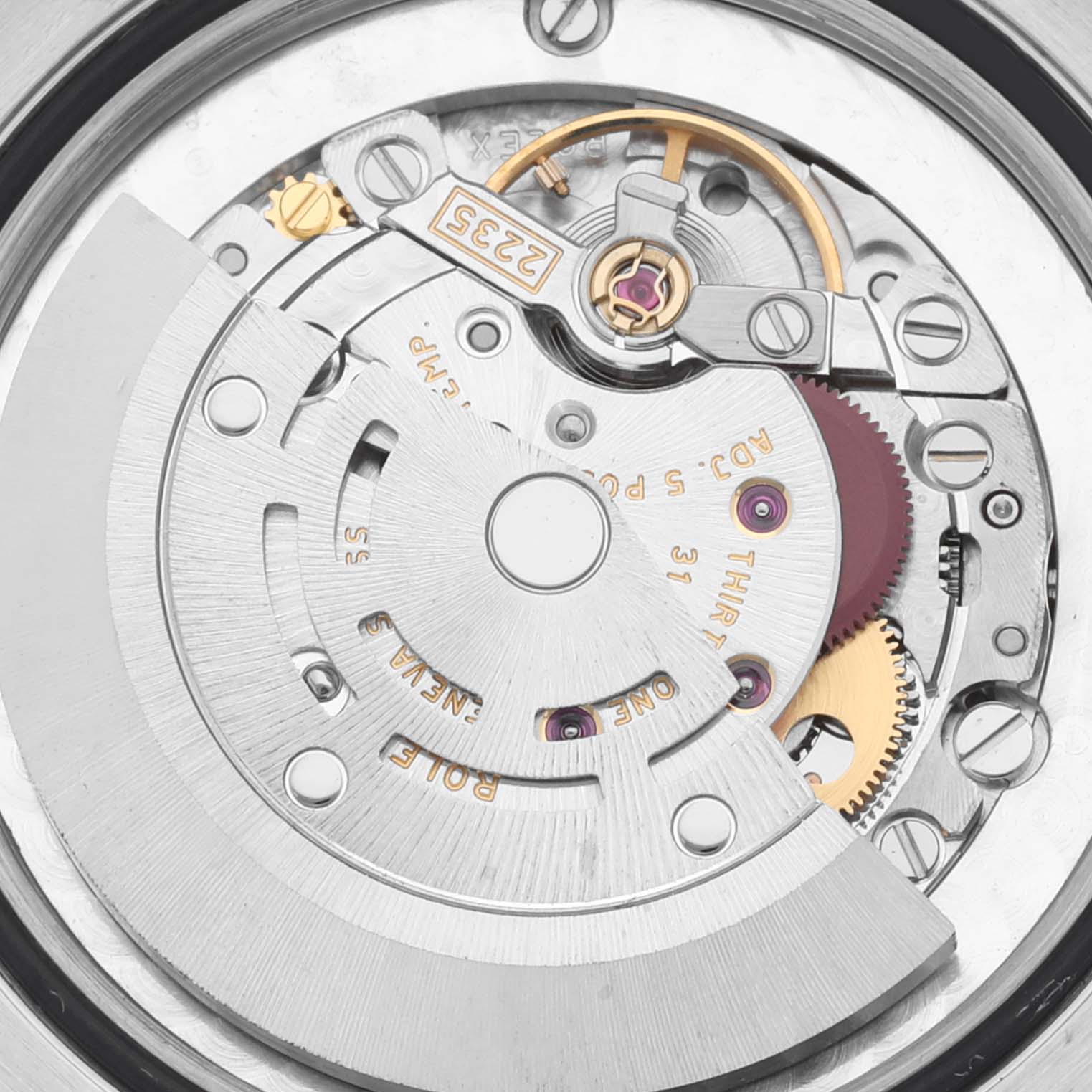 This image shows an inside view of the Rolex Mid-Size 178273 Women's Steel and Gold (two tone) Champagne Dial 178273 Women's Steel and Gold (two tone) Champagne Dial model, displaying its intricate watch movement and components.