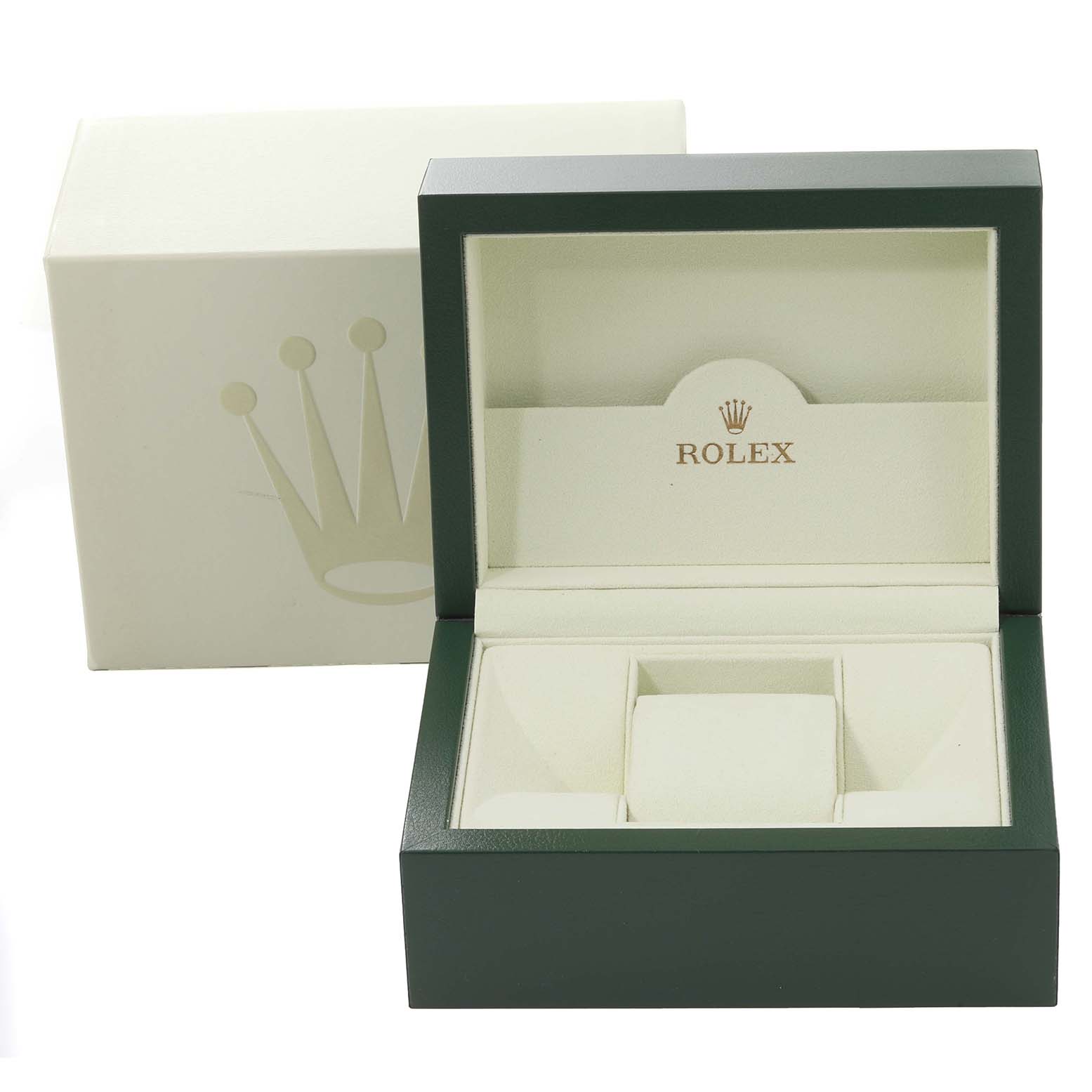 The image shows an open green Rolex watch box for the Mid-Size model, with the iconic crown logo and cream interior.