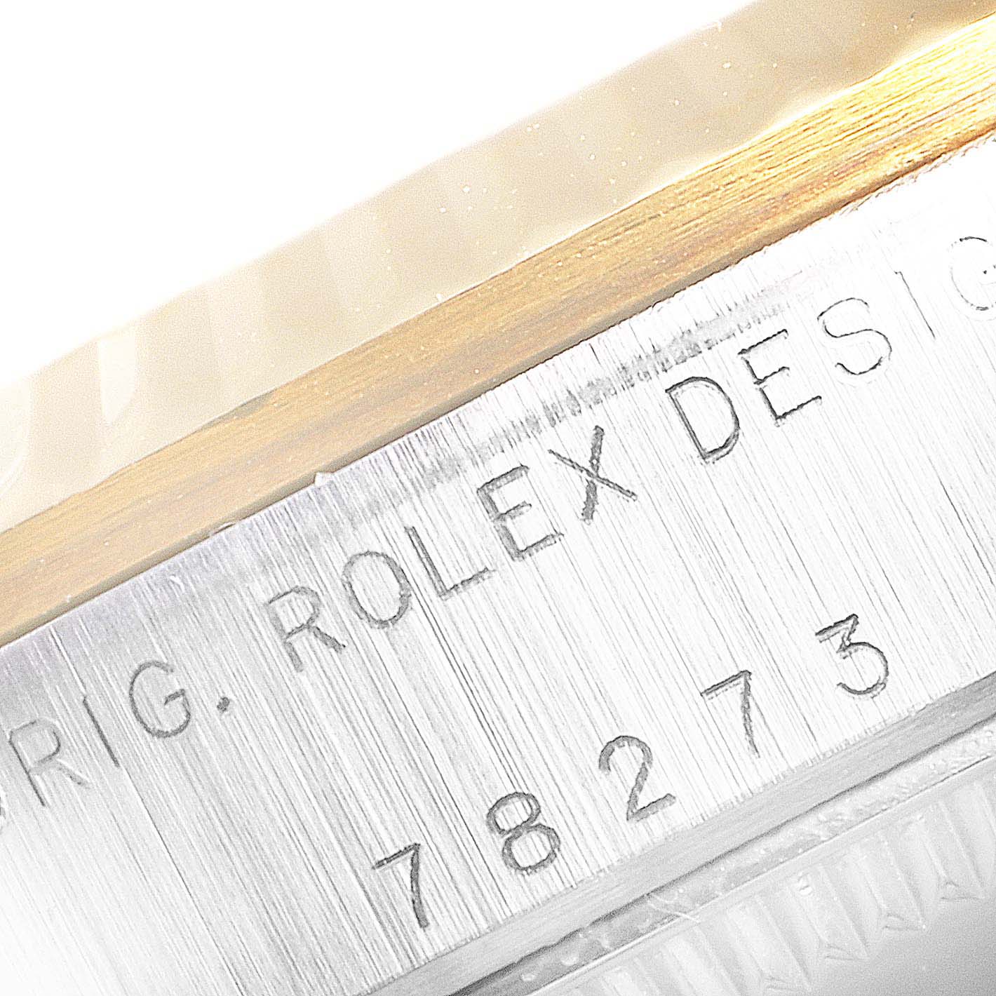 The image shows a close-up of the case side with the model number 78273, and 
ORIG. ROLEX DESIGN
 engraving of the Mid-Size Rolex watch.