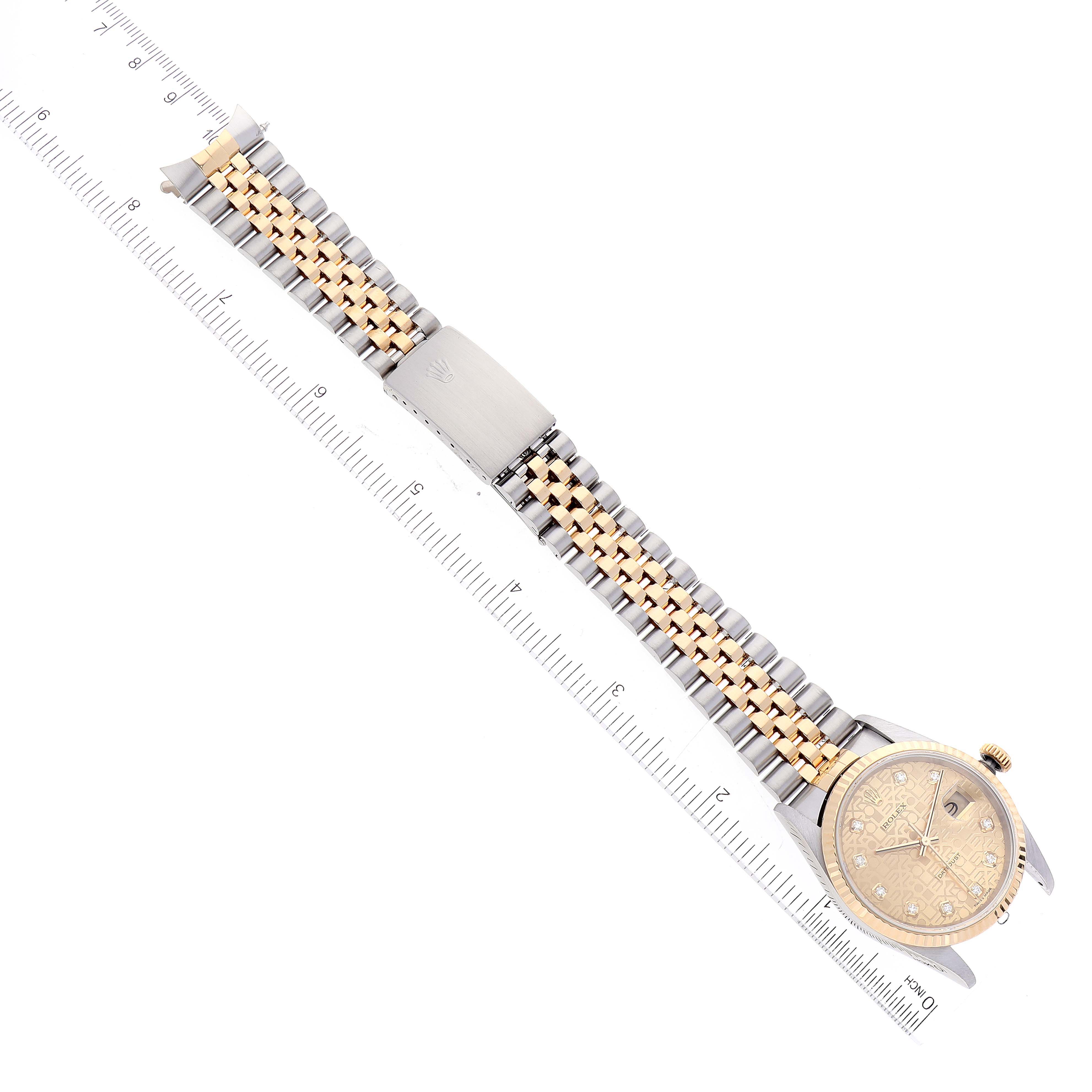 The Rolex Datejust 16233 Men's Steel and Gold (two tone) Champagne Dial 16233 Men's Steel and Gold (two tone) Champagne Dial watch is shown from a top-down angle, displaying the entire watch including its face, band, and clasp.