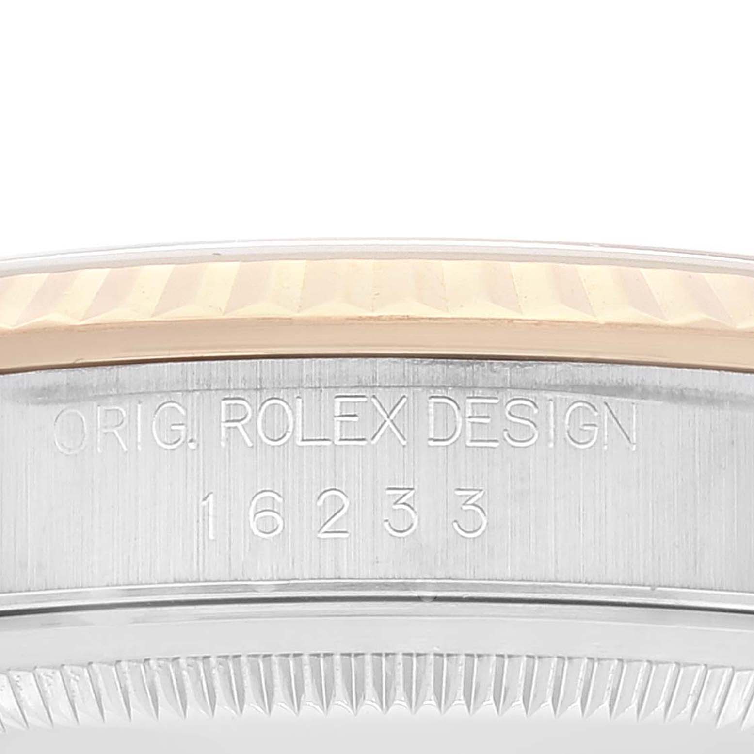 The image shows a close-up side view of the Rolex Datejust 16233 Men's Steel and Gold (two tone) Champagne Dial 16233 Men's Steel and Gold (two tone) Champagne Dial watch case with the engraved model number "16233."