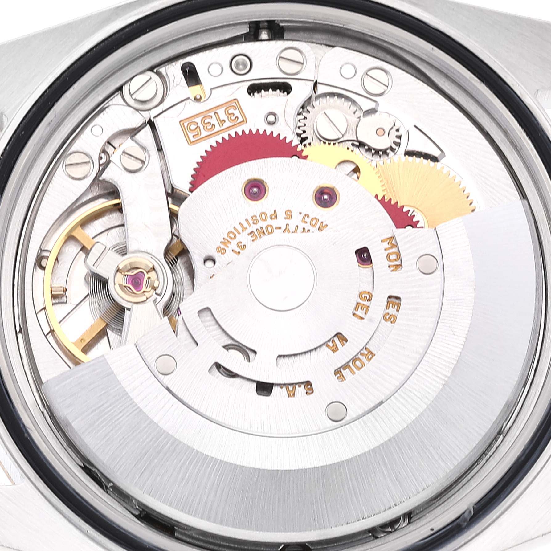 The image shows the internal movement mechanism of a Rolex Datejust 16233 Men's Steel and Gold (two tone) White Dial 16233 Men's Steel and Gold (two tone) White Dial watch viewed from the back.
