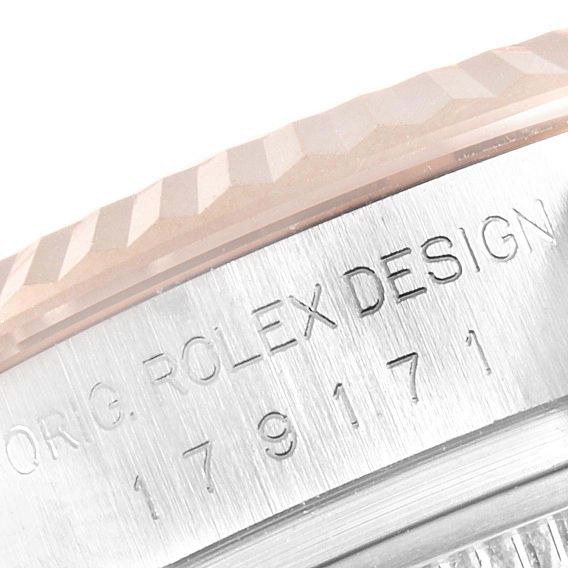 The close-up image shows the engraved bezel and case side of a Rolex Datejust 179171 Women's Steel and Gold (two tone) White Dial 179171 Women's Steel and Gold (two tone) White Dial.