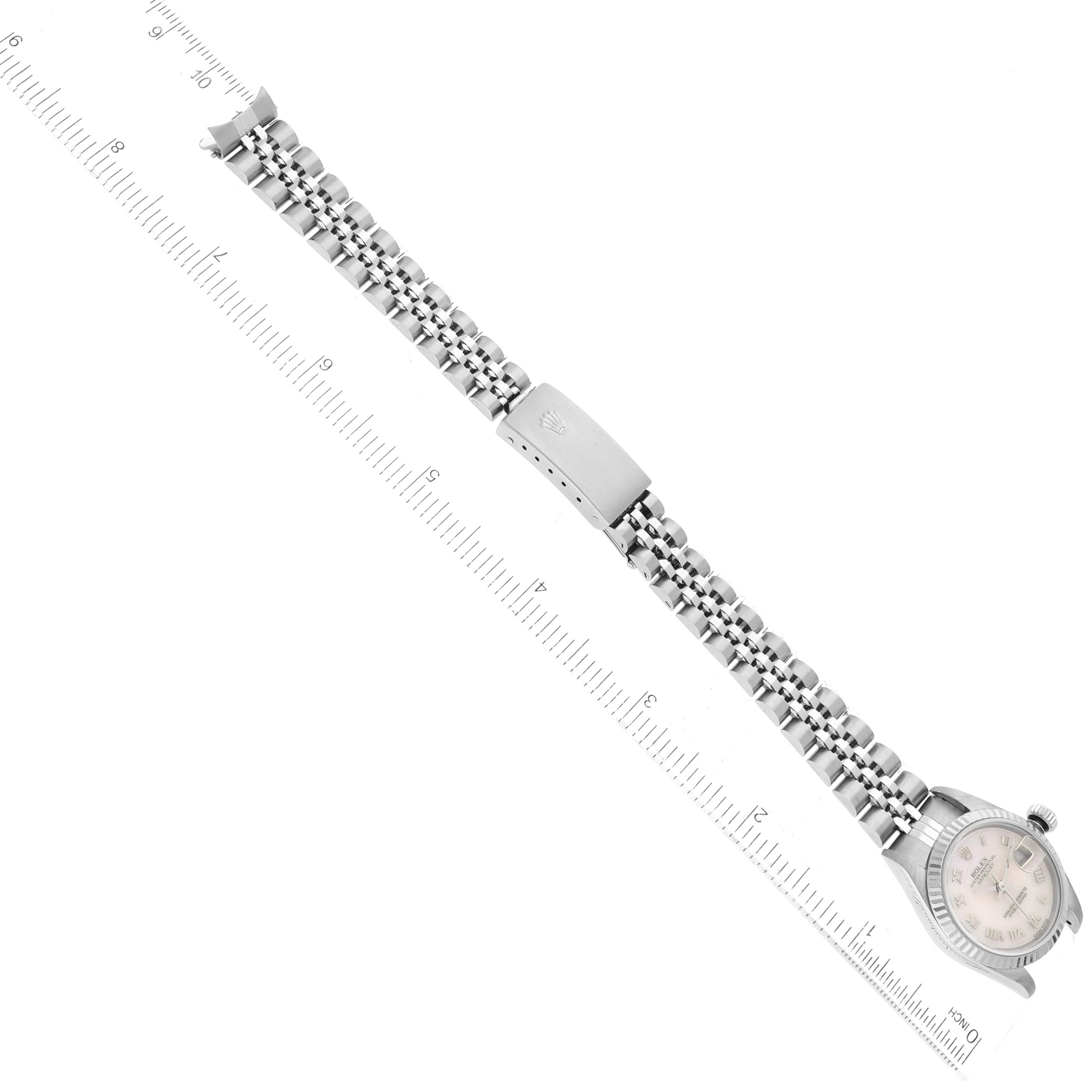 The image shows a top-down view of a Rolex Datejust 79174 Women's Stainless Steel Mother of Pearl Dial 79174 Women's Stainless Steel Mother of Pearl Dial watch, highlighting its full bracelet and clasp.