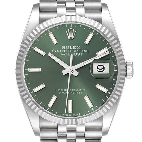 The image shows a front view of a Rolex Datejust watch with a green dial and fluted bezel.