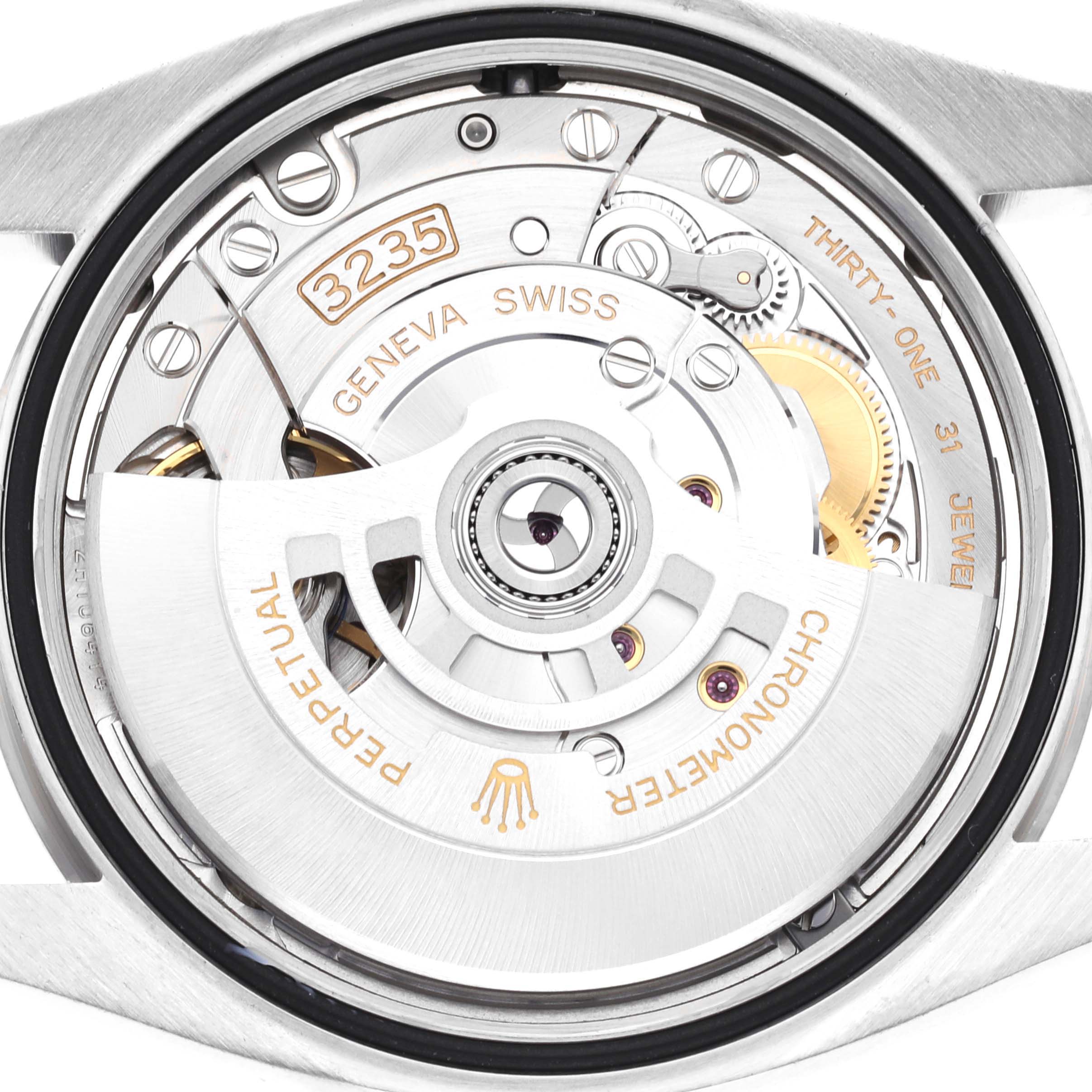 The image shows a close-up view of the movement inside a Rolex Datejust 126234 Men's Stainless Steel Green Dial 126234 Men's Stainless Steel Green Dial watch, highlighting the Caliber 3235.