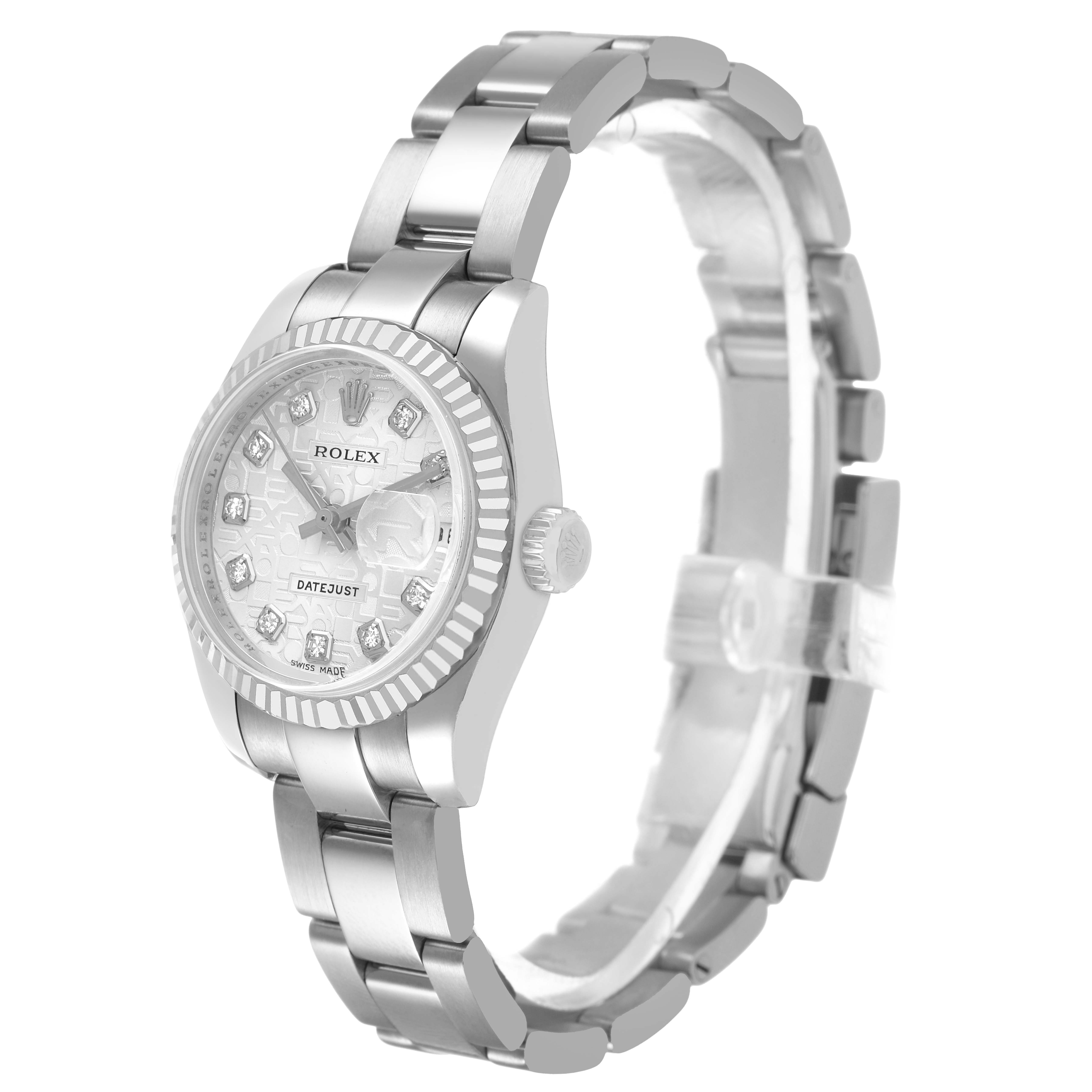The Rolex Datejust 179174 Women's Stainless Steel Silver Dial watch is shown in a side angle featuring the bracelet, case, and fluted bezel.