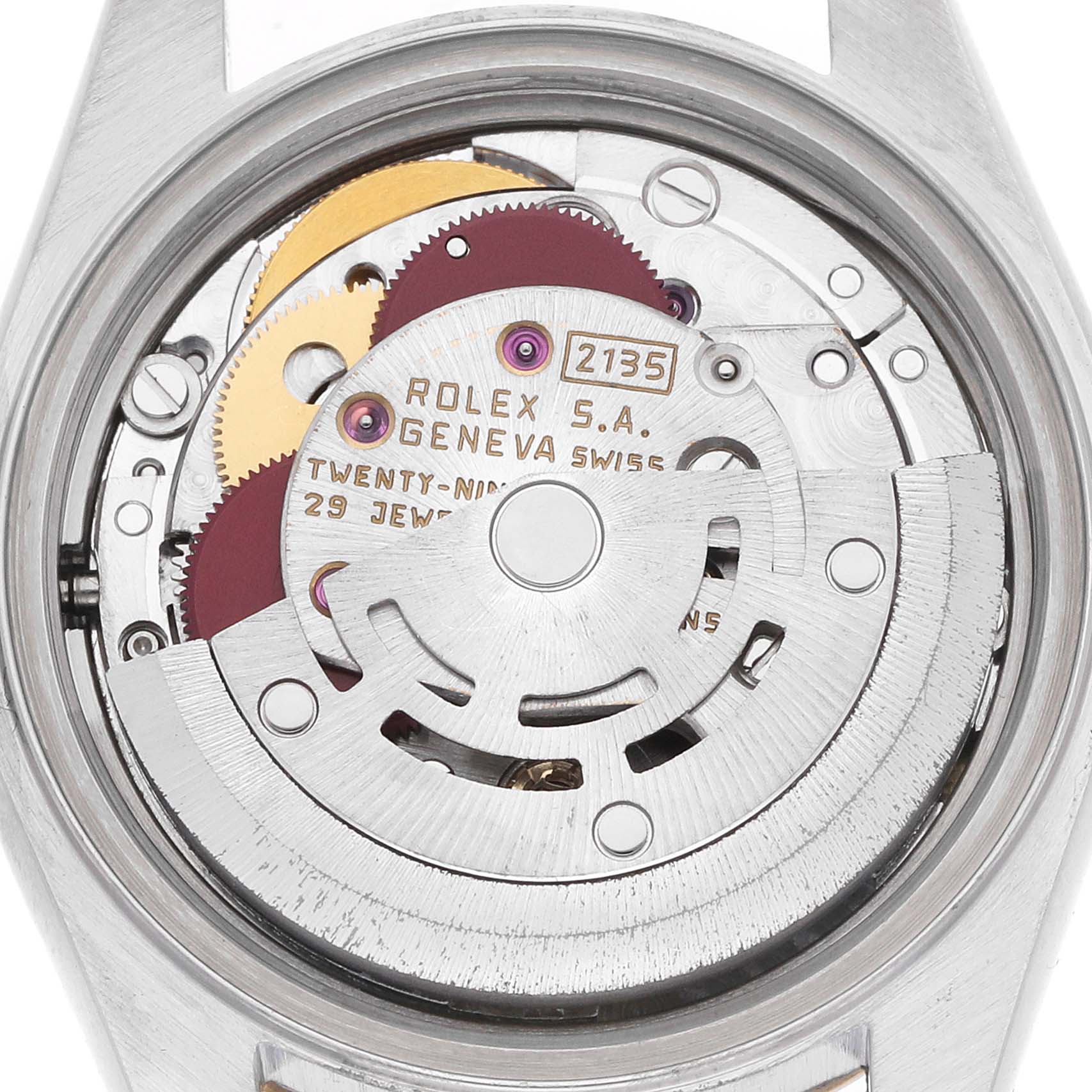 The image shows the movement and rotor mechanism of a Rolex Datejust 69173 Women's Steel and Gold (two tone) Champagne Dial watch from the back.
