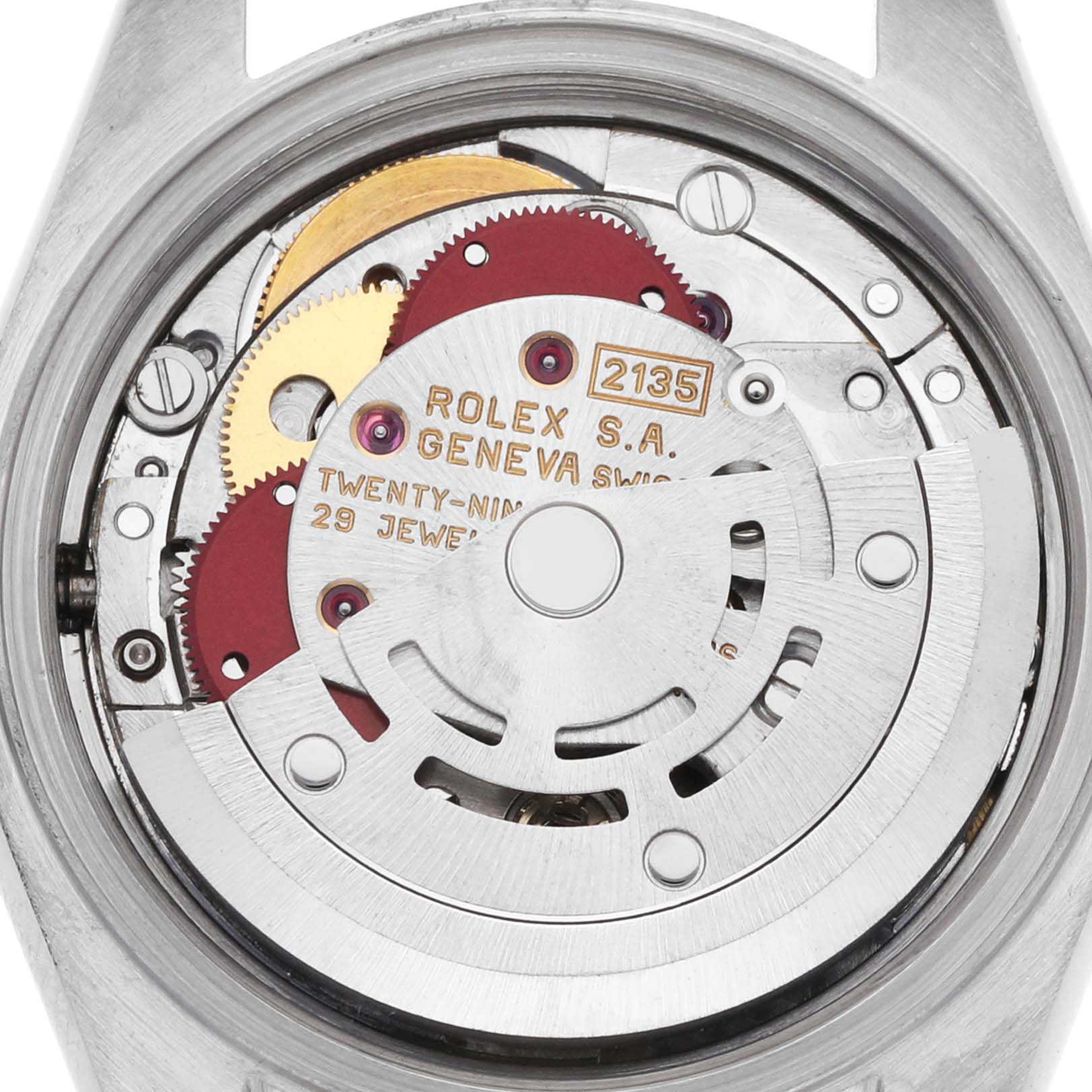 This is an image of the inner mechanical movement of a Rolex Datejust 69173 Women's Steel and Gold (two tone) Champagne Dial watch, showing gears and intricate components up close.