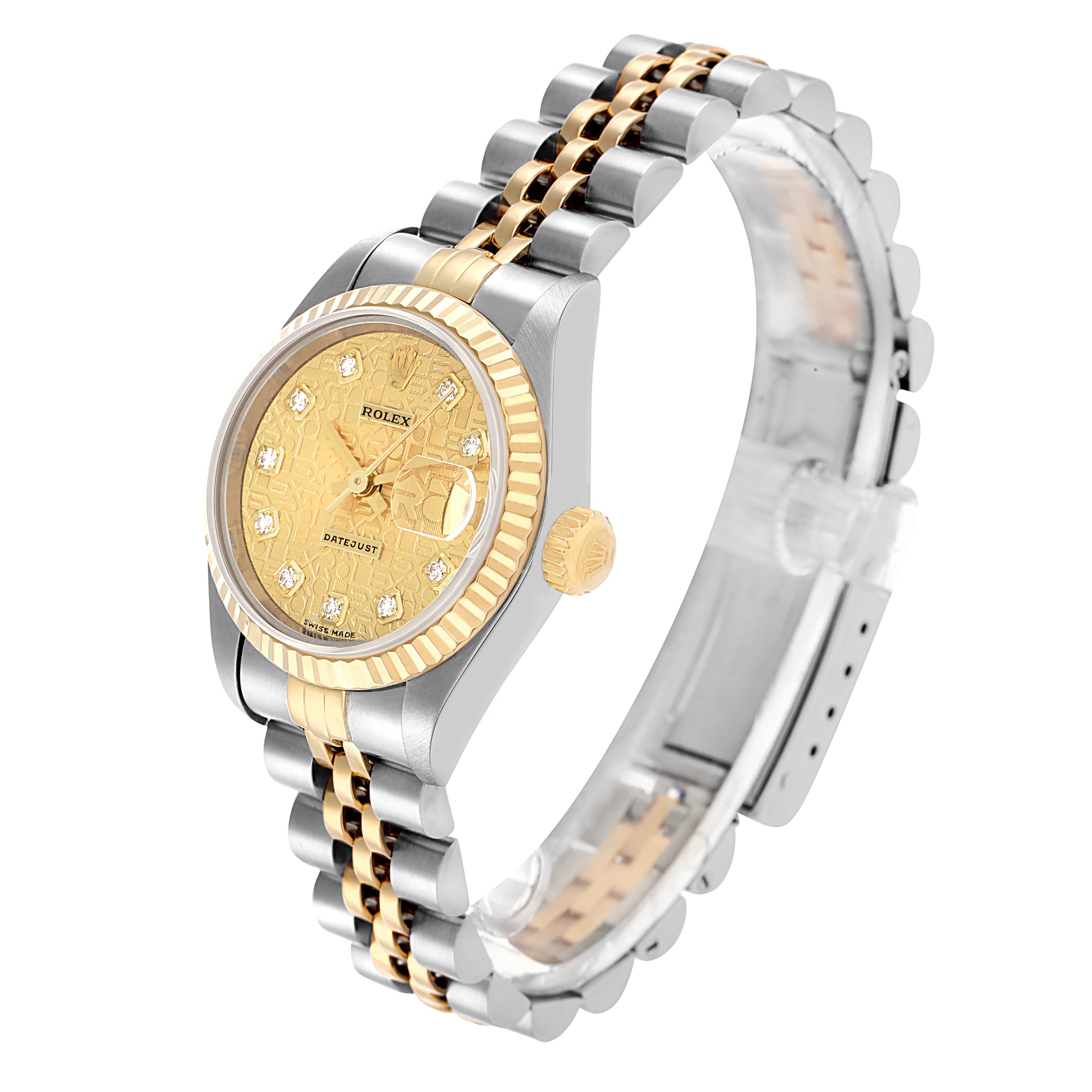 The Rolex Datejust 69173 Women's Steel and Gold (two tone) Champagne Dial watch is shown at a three-quarter angle, highlighting the gold and silver case, bracelet, and textured dial.