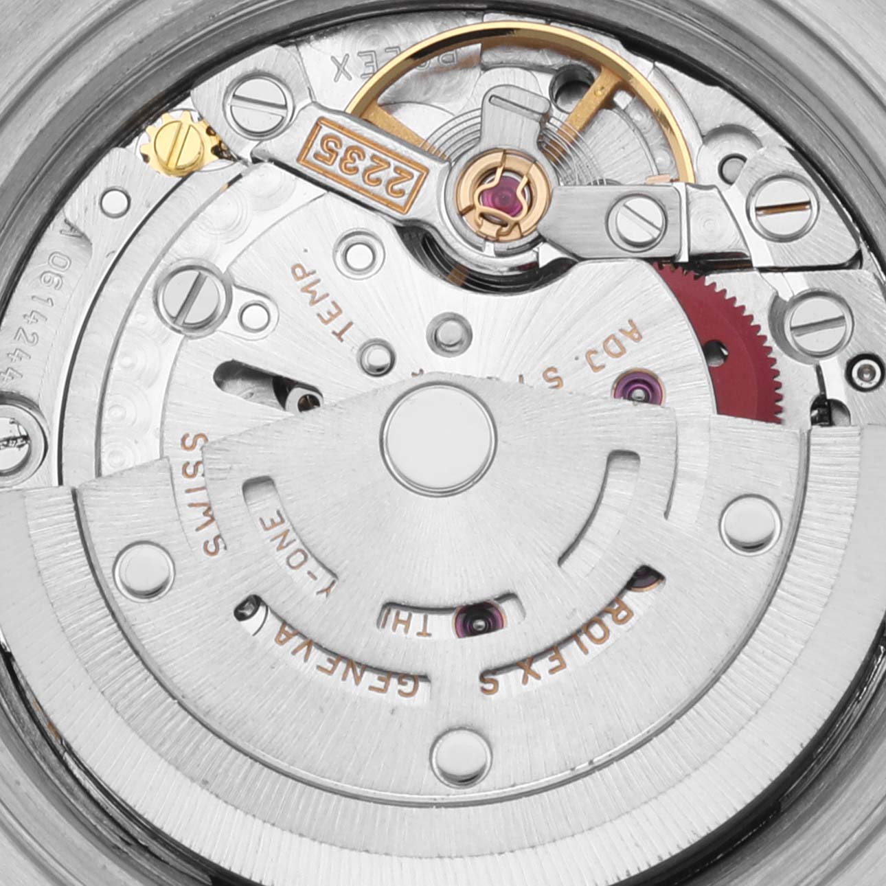This close-up image shows the intricate internal mechanism of a Rolex Datejust 79173 Women's Steel and Gold (two tone) Silver Dial 79173 Women's Steel and Gold (two tone) Silver Dial watch, featuring gears and a rotor.