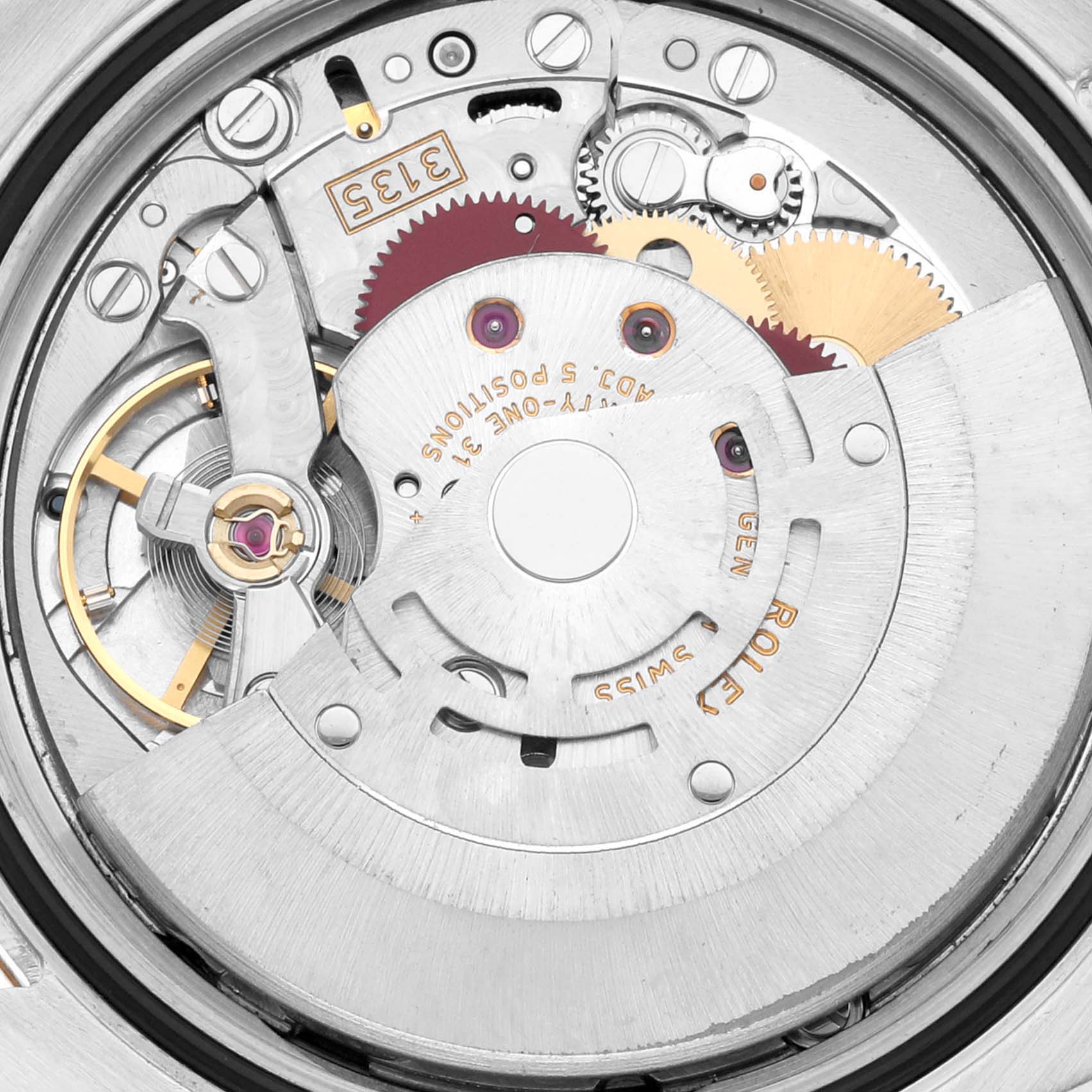 The image shows the internal movement of a Rolex Datejust 116233 Men's Steel and Gold (two tone) White Dial 116233 Men's Steel and Gold (two tone) White Dial watch, with visible gears and rotor.