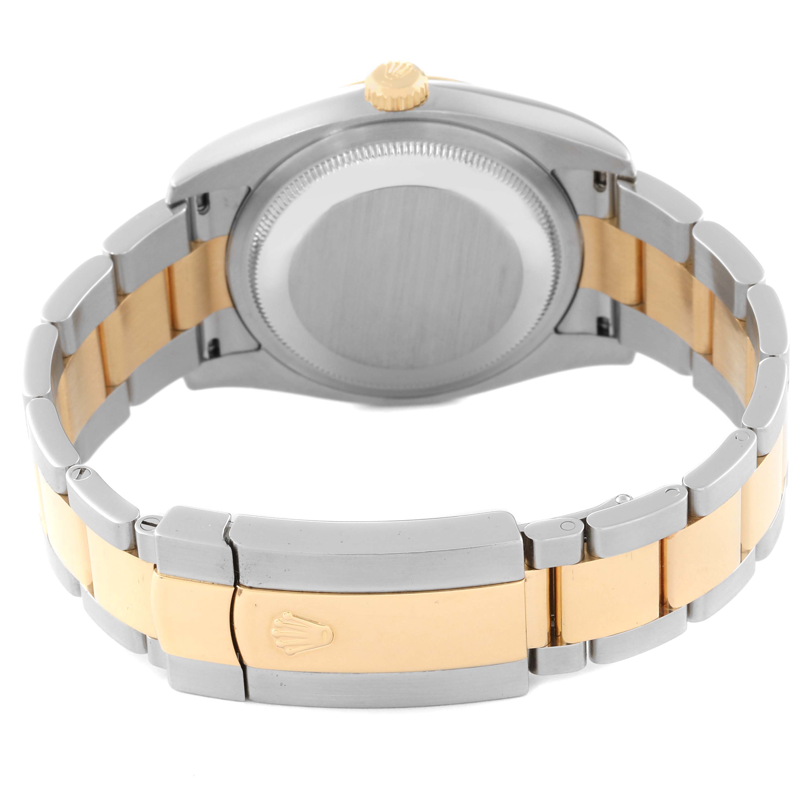 This image shows the back of the Rolex Datejust 116233 Men's Steel and Gold (two tone) White Dial 116233 Men's Steel and Gold (two tone) White Dial watch, highlighting the case back, the crown, and the two-tone bracelet with a clasp.