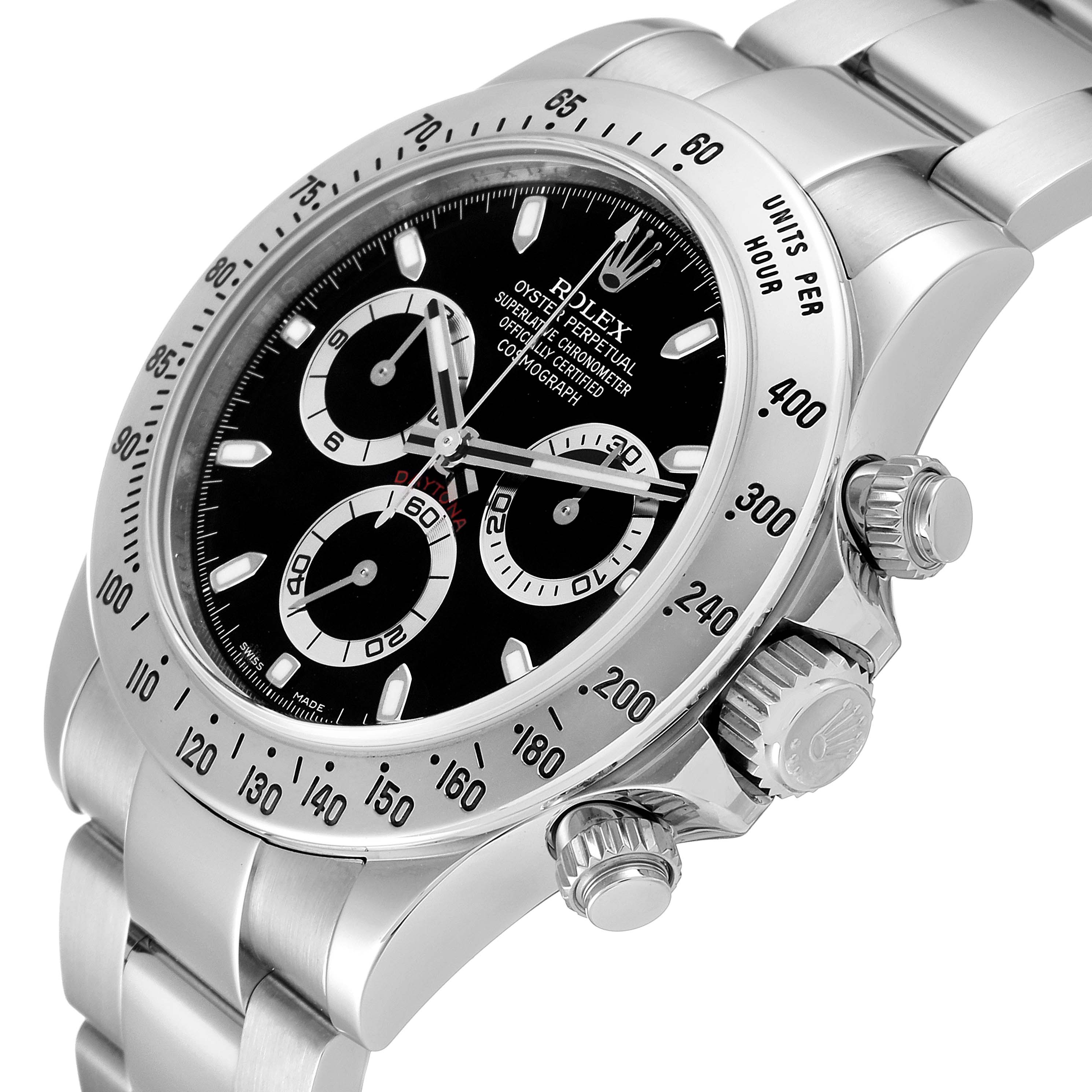 The image shows a close-up view of the Rolex Daytona 116520 Men
s Stainless Steel Black Dial 116520 Men
s Stainless Steel Black Dial
s face, bezel, crown, and part of its bracelet.