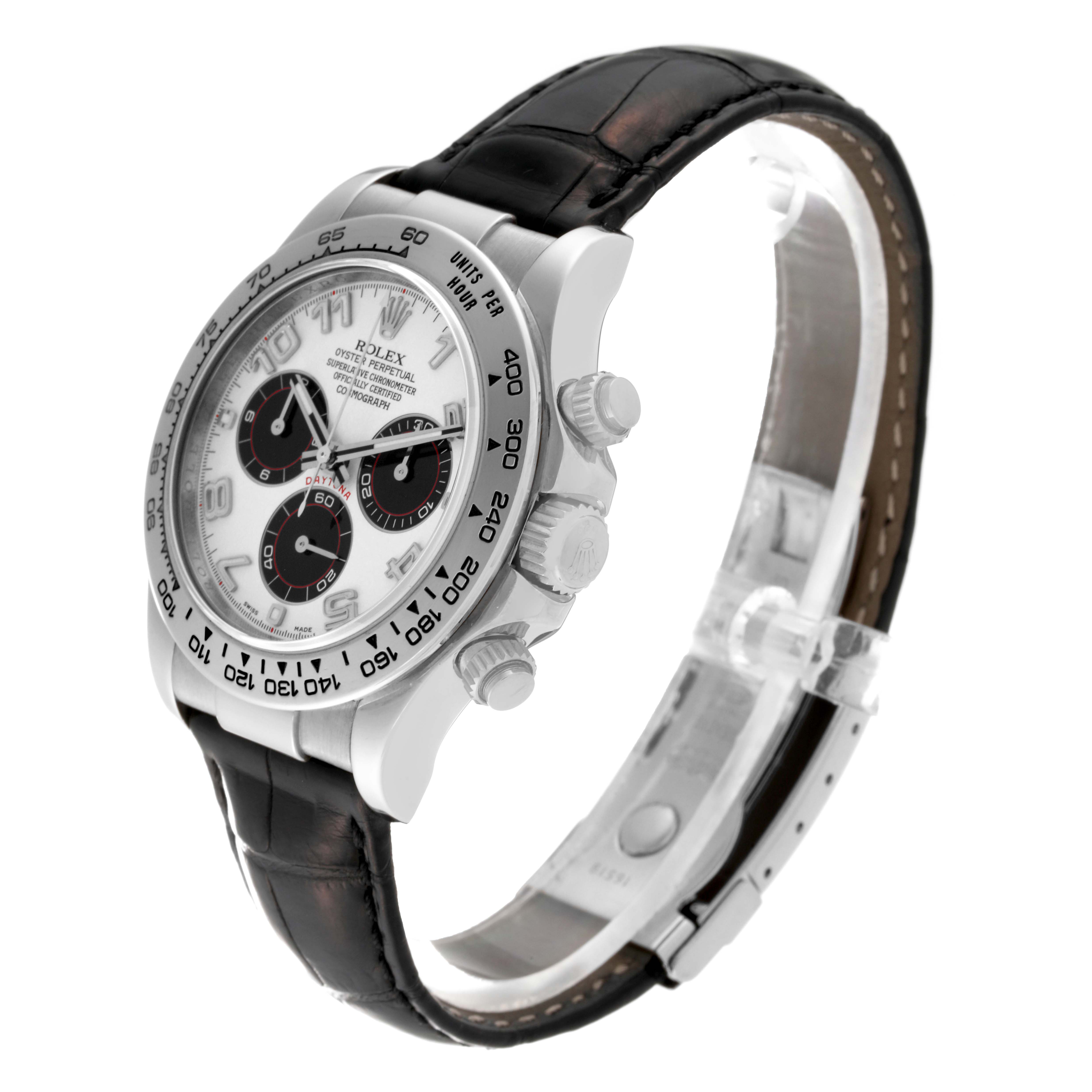 The Rolex Daytona 116519 Men's White Gold Silver Dial 116519 Men's White Gold Silver Dial watch is shown at an angled view, displaying its bezel, dial with subdials, chronograph pushers, and leather strap.