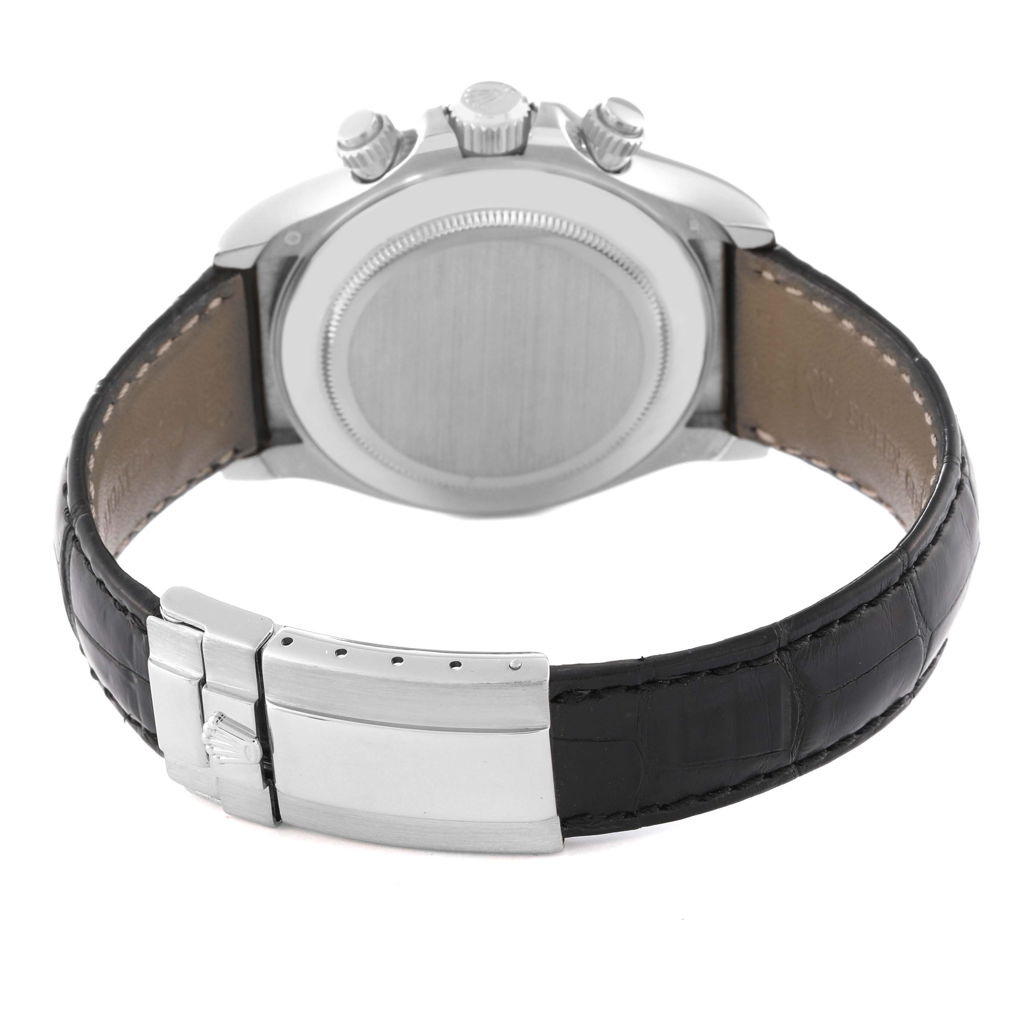 This image shows the back of a Rolex Daytona 116519 Men's White Gold Silver Dial 116519 Men's White Gold Silver Dial watch, displaying its crown, pushers, and leather strap with clasp.