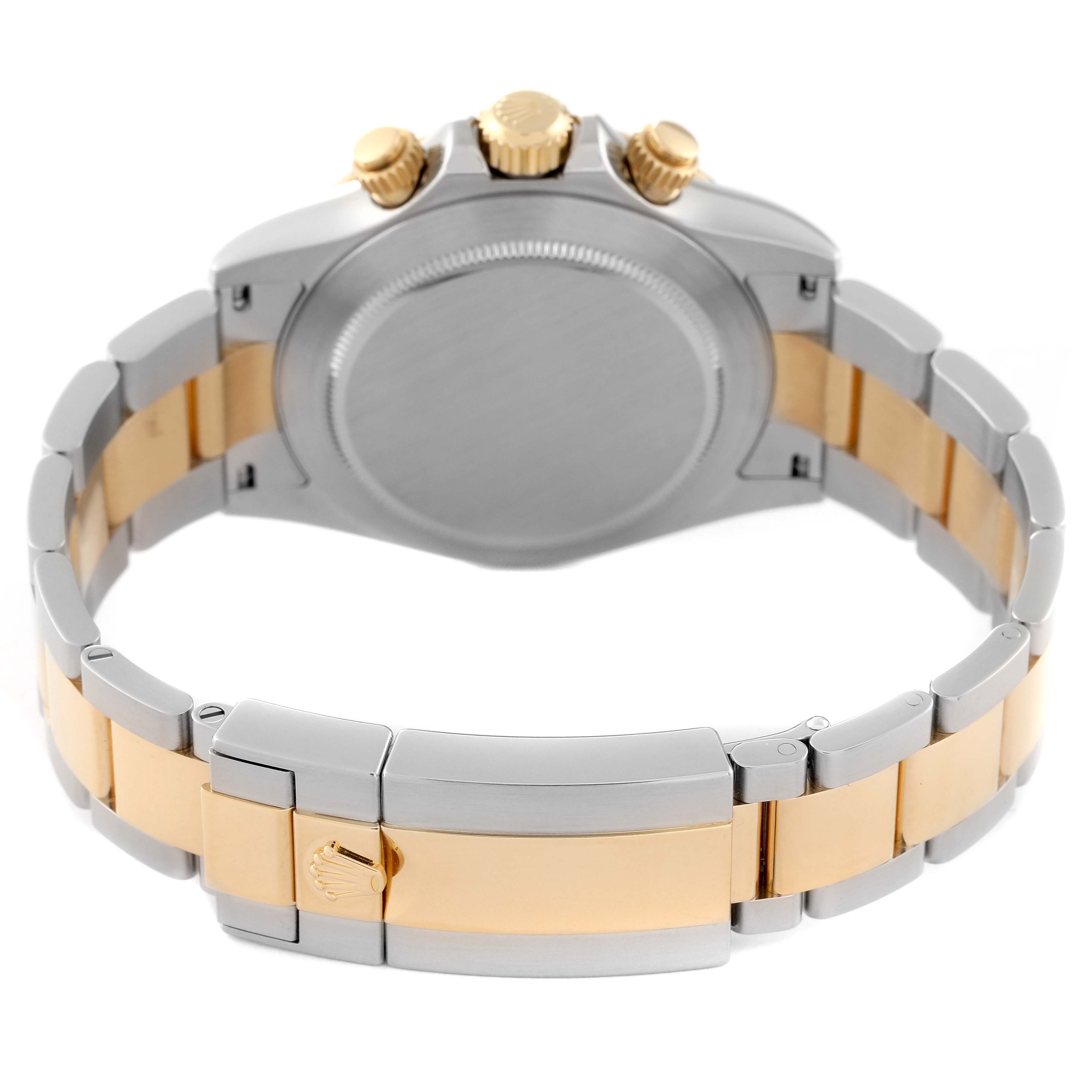 The image shows the back side of a Rolex Daytona 116523 Men
s Steel and Gold (two tone) Black Dial 116523 Men
s Steel and Gold (two tone) Black Dial watch, highlighting the case, crown, pushers, and two-tone bracelet.