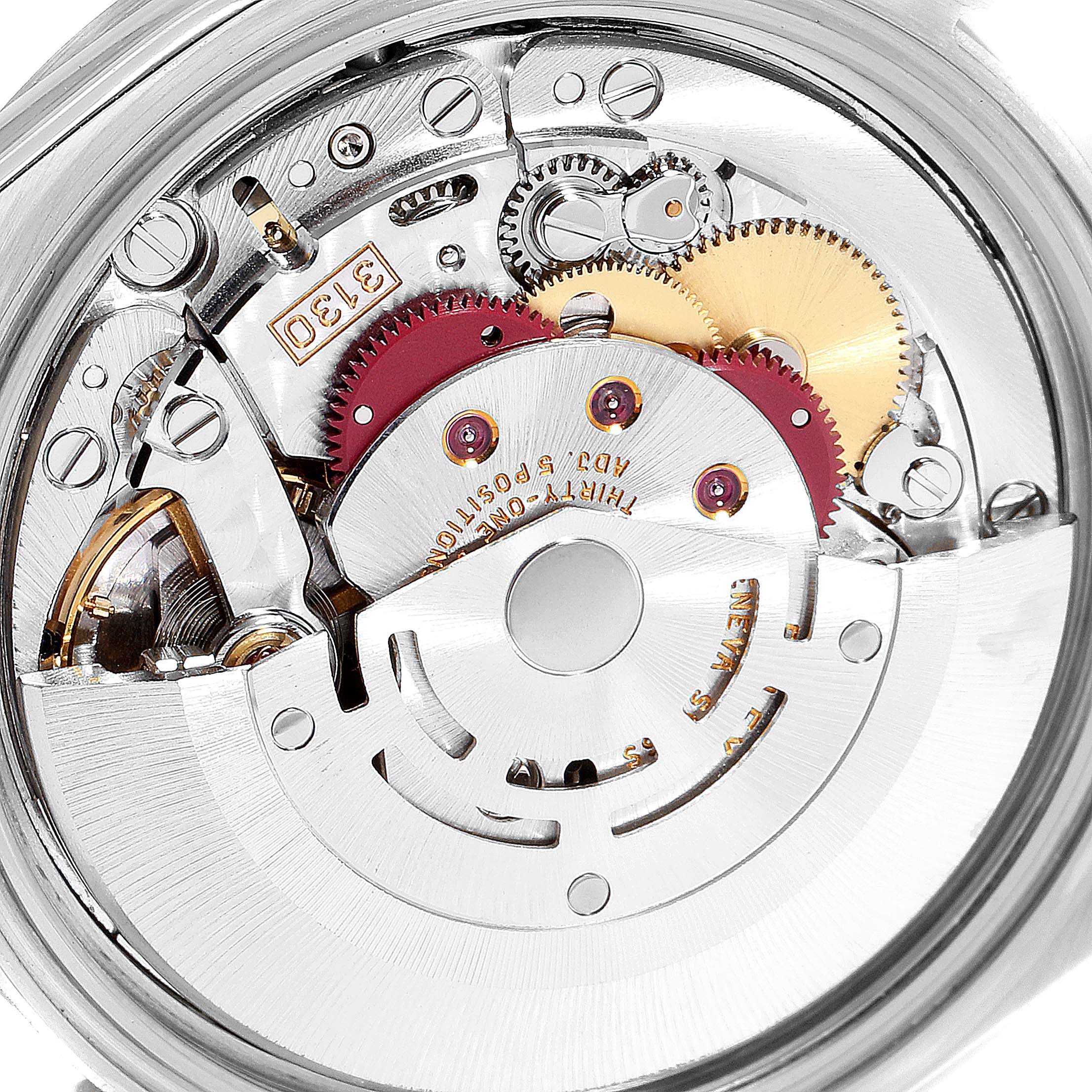This image shows a close-up view of the movement and inner gears of the Rolex Explorer 114270 Men
s Stainless Steel Black Dial 114270 Men
s Stainless Steel Black Dial watch.