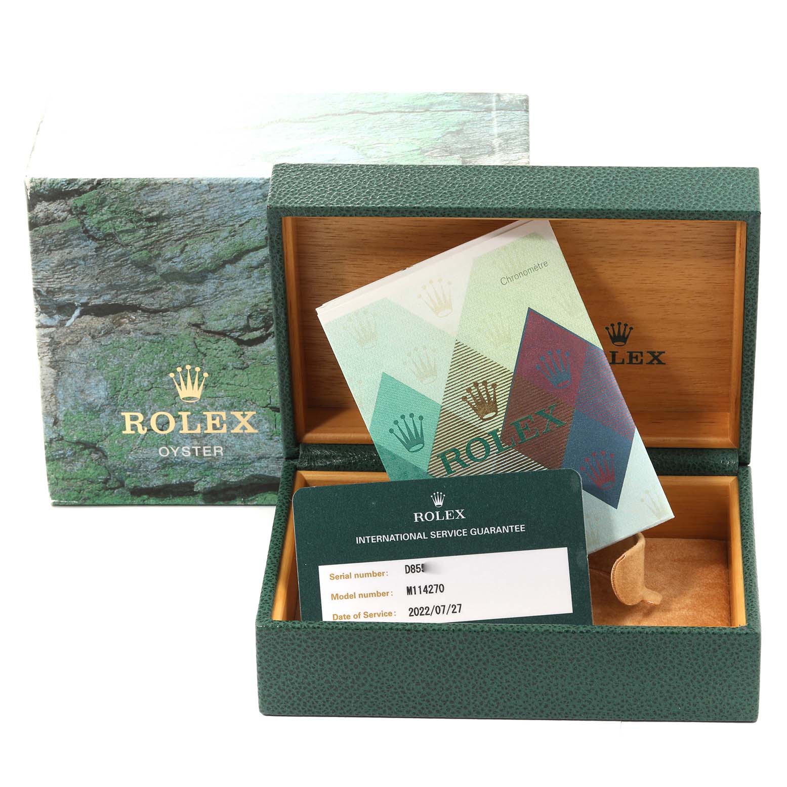The image shows the packaging, guarantee card, and booklet for a Rolex Explorer 114270 Men's Stainless Steel Black Dial 114270 Men's Stainless Steel Black Dial model.