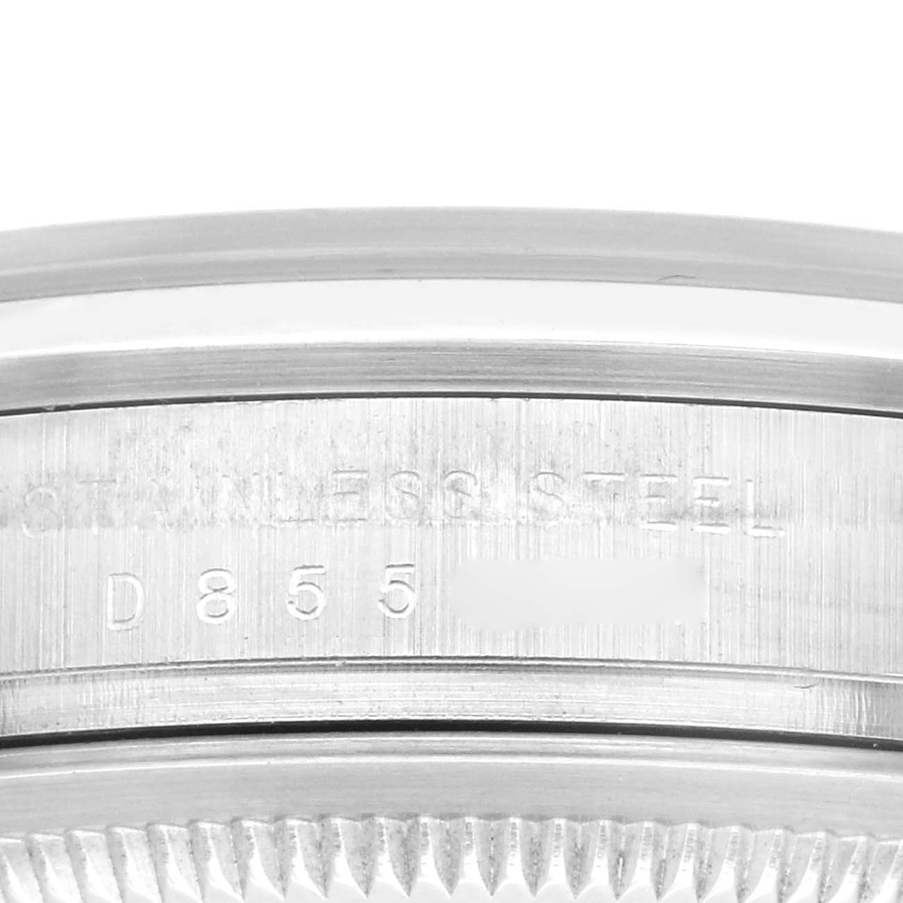 This close-up image shows the side and bezel of the Rolex Explorer 114270 Men's Stainless Steel Black Dial 114270 Men's Stainless Steel Black Dial watch, highlighting the engravings on the stainless steel.