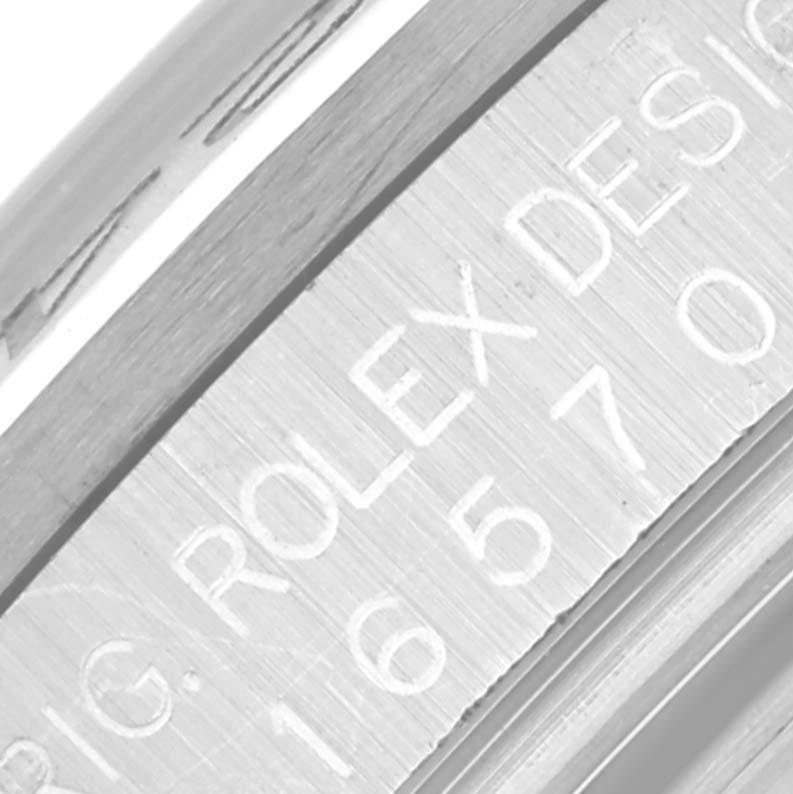 The image shows a close-up of the inner bezel with engravings on a Rolex Explorer 16570 Men's Stainless Steel White Dial 16570 Men's Stainless Steel White Dial watch.