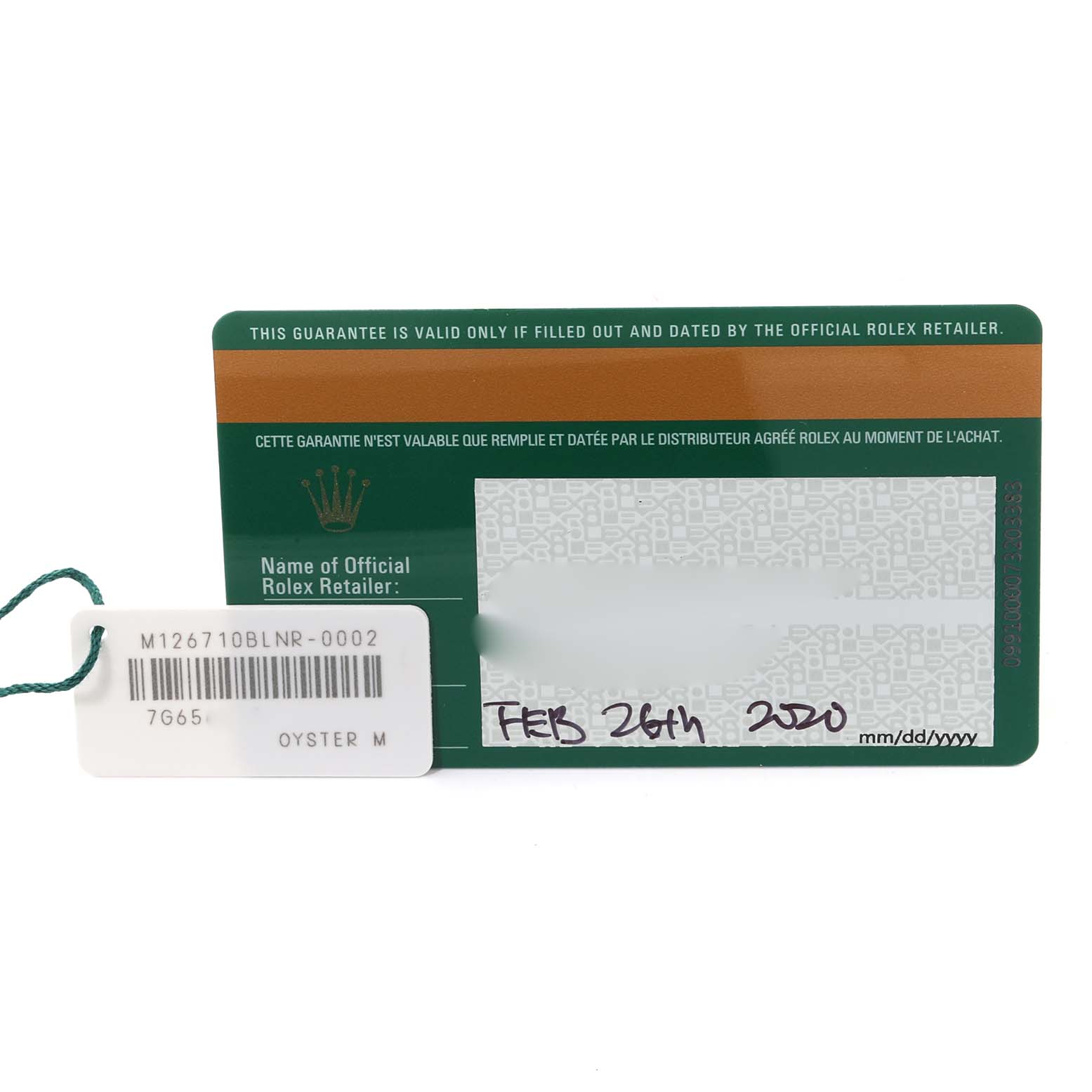 This image shows a guarantee card and a tag for the Rolex GMT-Master 126710BLNR Men's Stainless Steel Black Dial 126710BLNR Men's Stainless Steel Black Dial model.