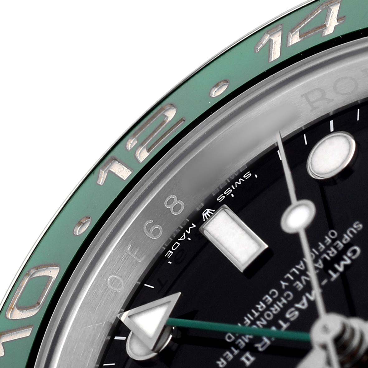 The image shows a close-up of a Rolex GMT-Master 126720VTNR Men's Stainless Steel Black Dial watch, focusing on the bezel, dial, and hands.
