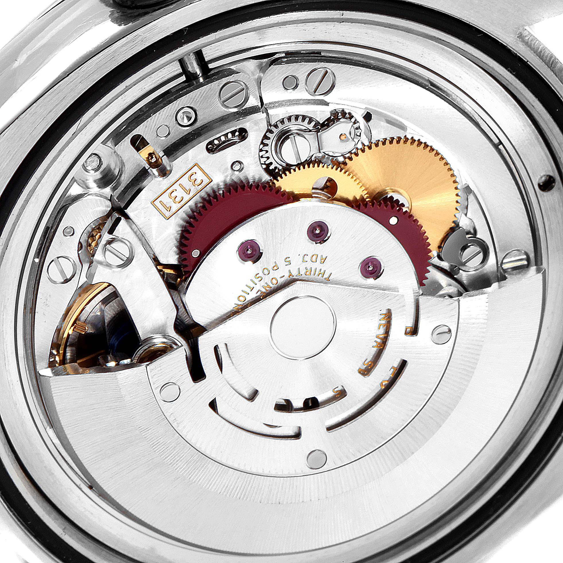 The image shows a close-up view of the movement and inner mechanical parts of the Rolex Milgauss 116400GV Men's Stainless Steel Black Dial 116400GV Men's Stainless Steel Black Dial watch.