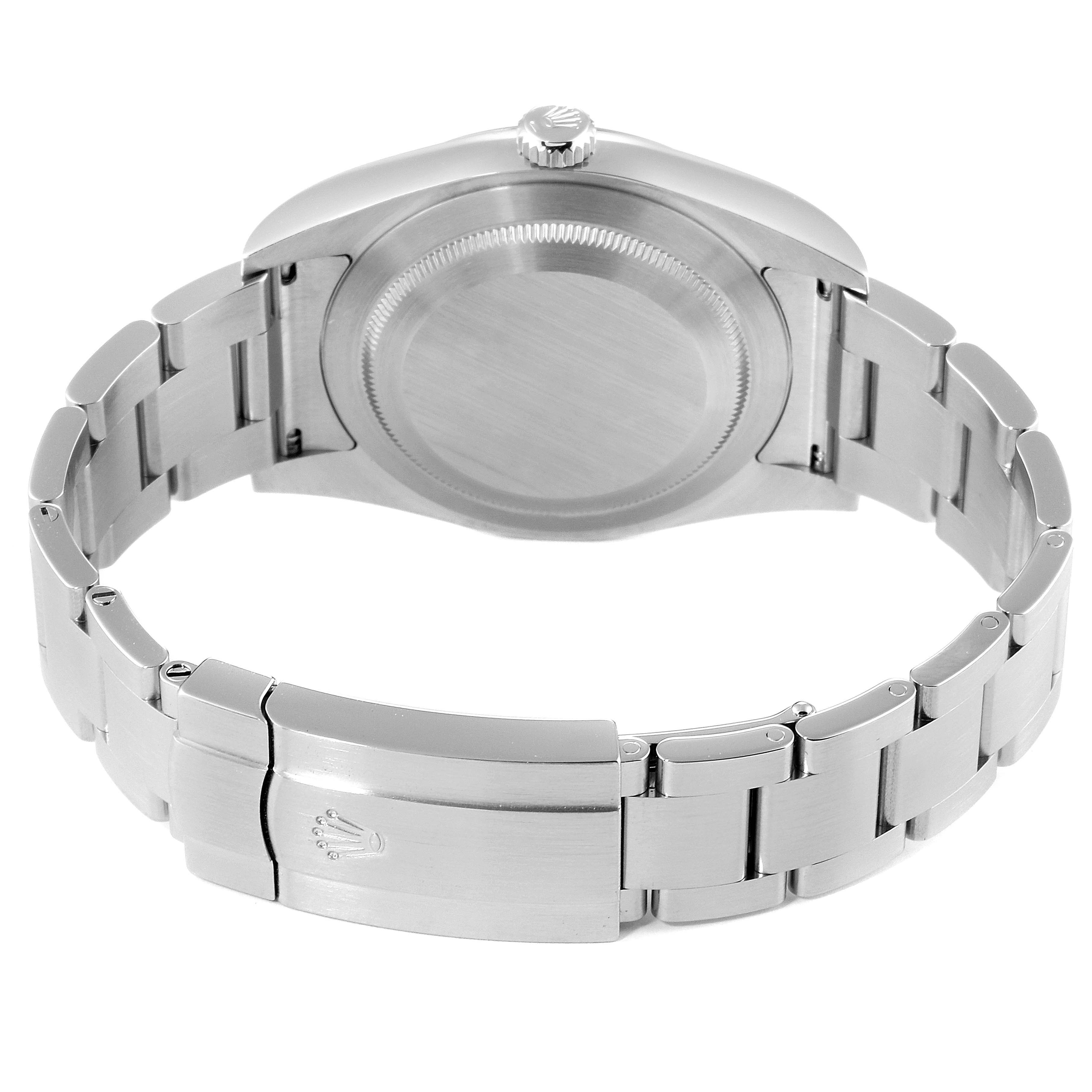 The image shows the backside, bracelet, clasp, and crown of a Rolex Oyster Perpetual 114300 Men's Stainless Steel Burgundy Dial 114300 Men's Stainless Steel Burgundy Dial watch.