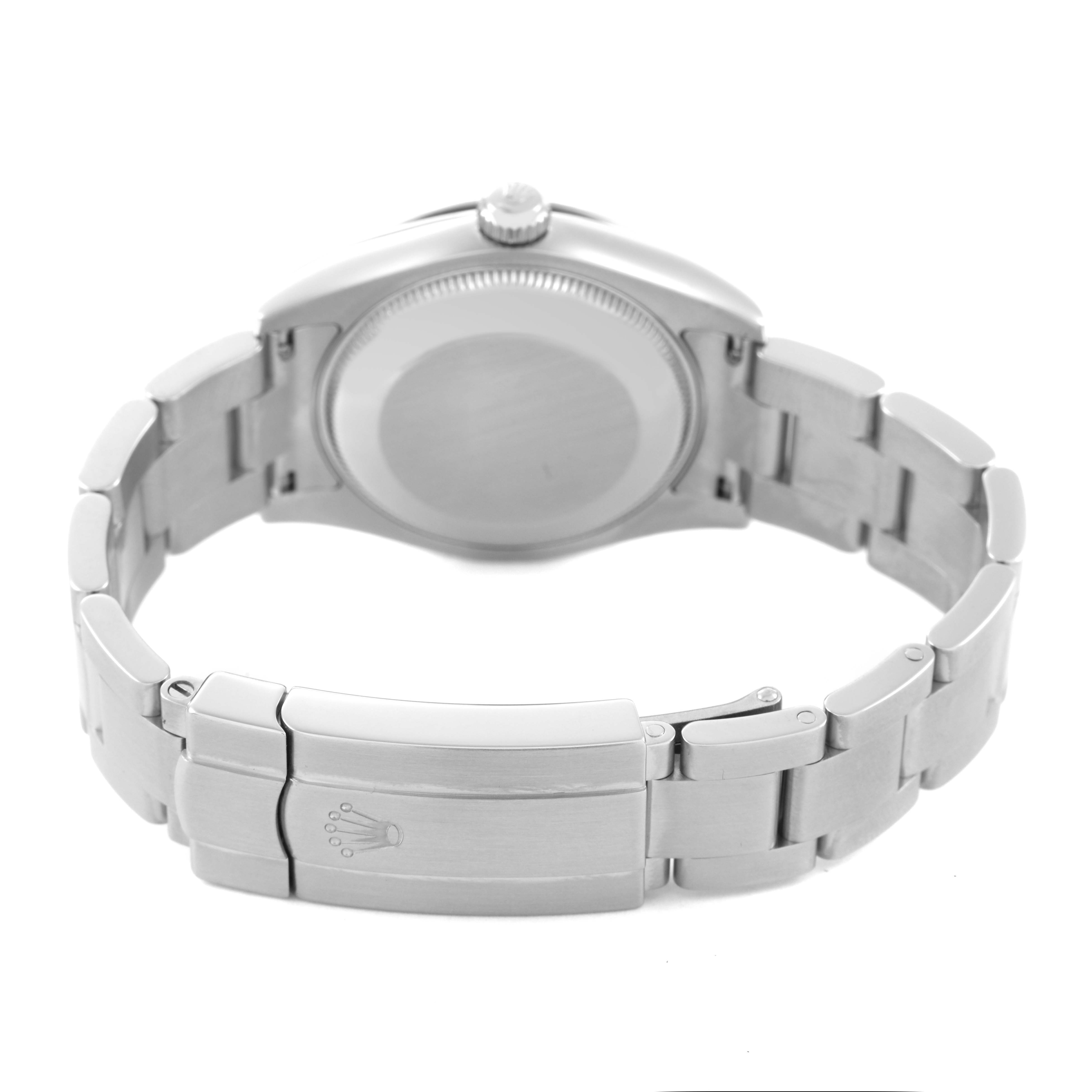 The image shows the back of the Rolex Oyster Perpetual 177234 Women's Stainless Steel Black Dial watch, including the closed clasp and bracelet links.