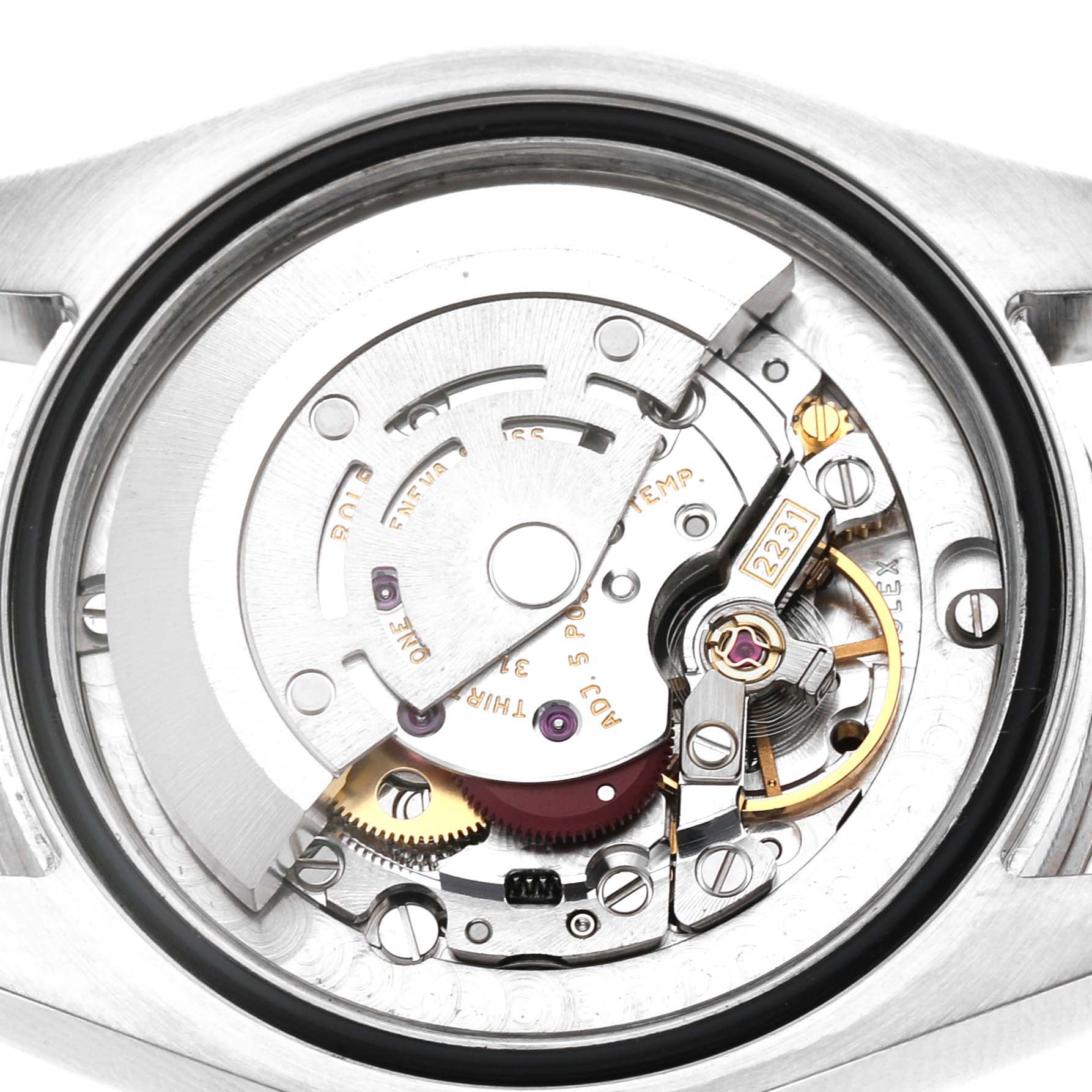 This image shows the intricate internal mechanism of a Rolex Oyster Perpetual 177234 Women's Stainless Steel Black Dial watch from the back view.